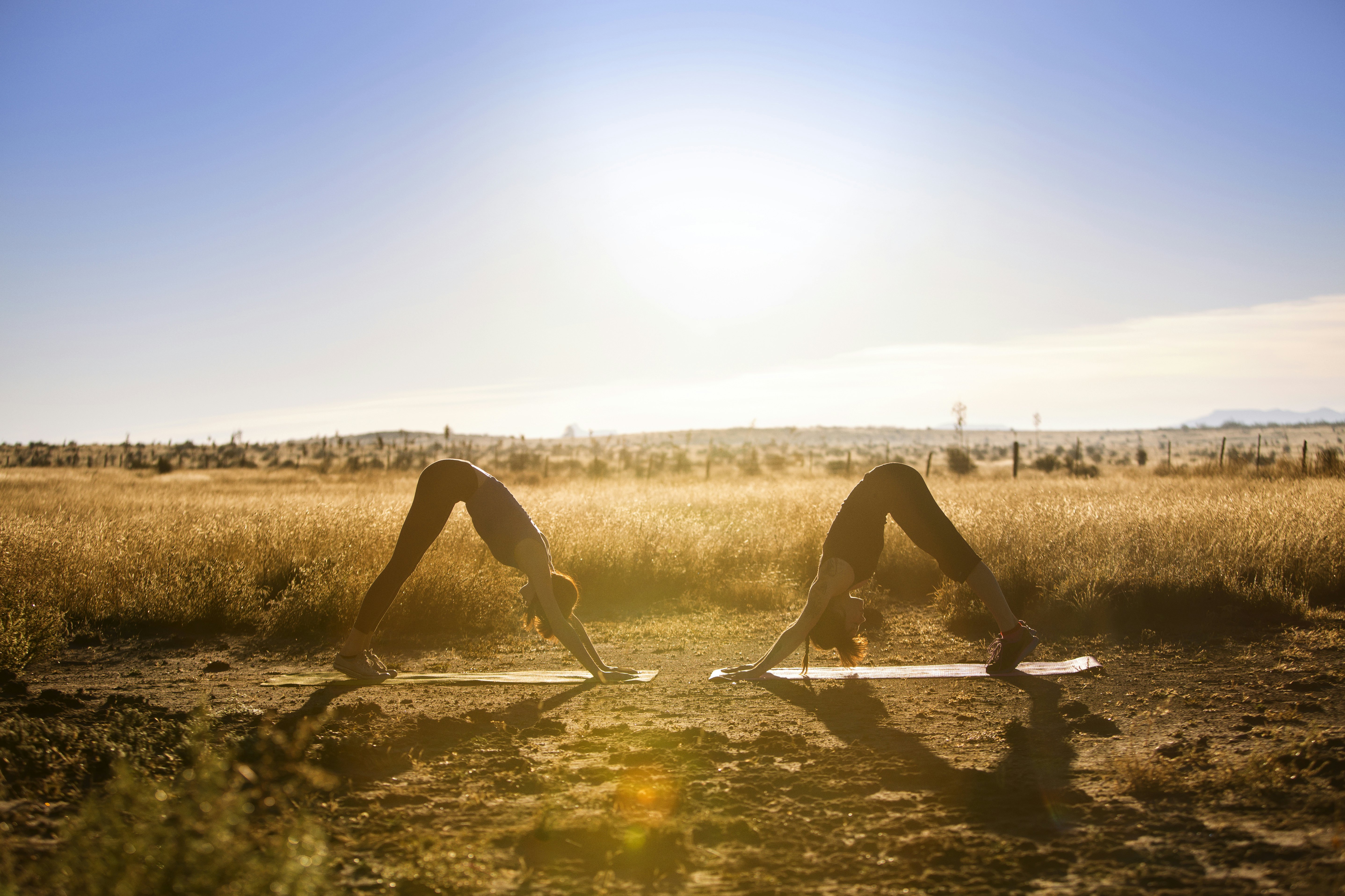 Two women practising yoga in Texas