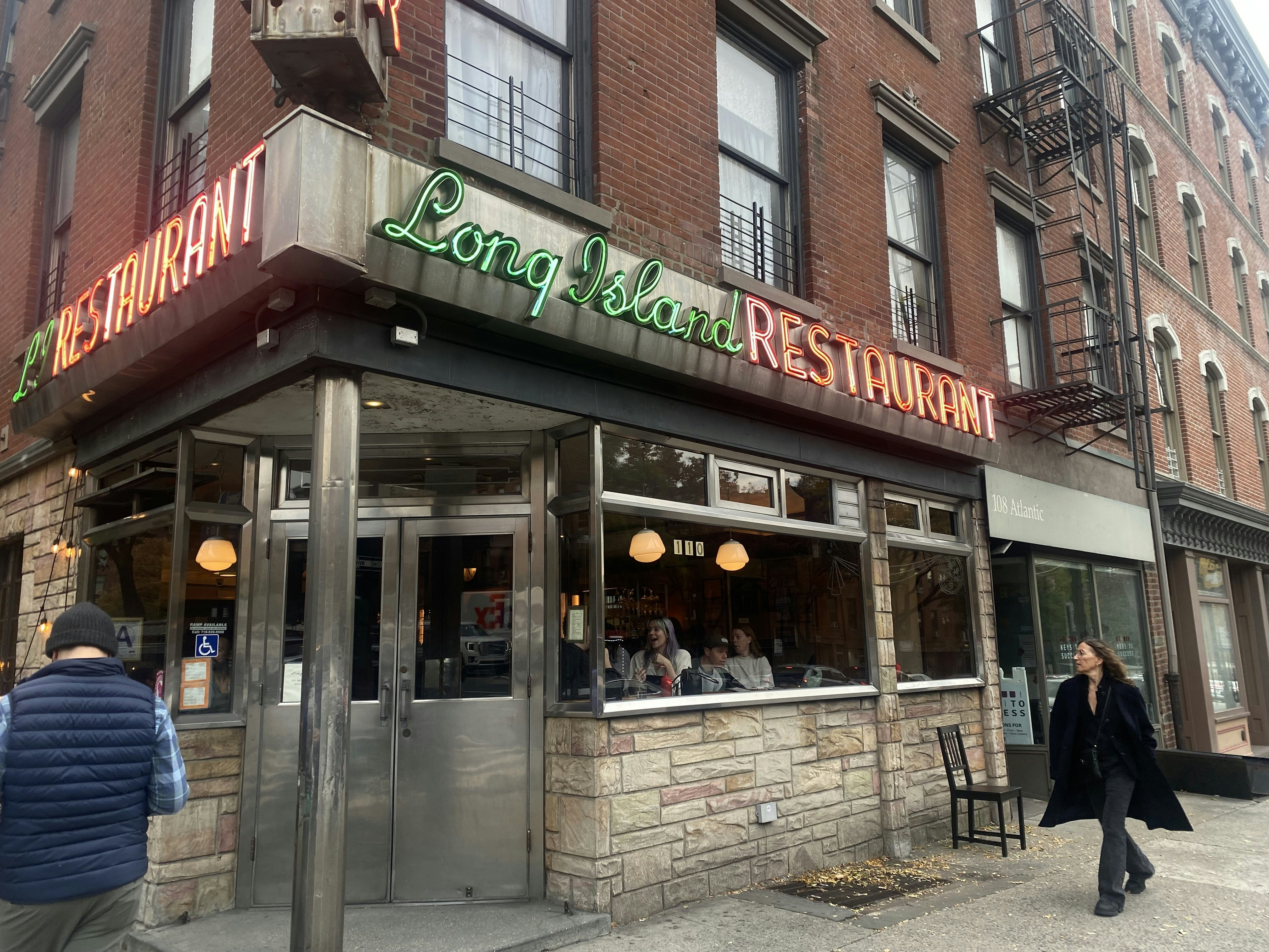 The exterior of a city bar on a cold day