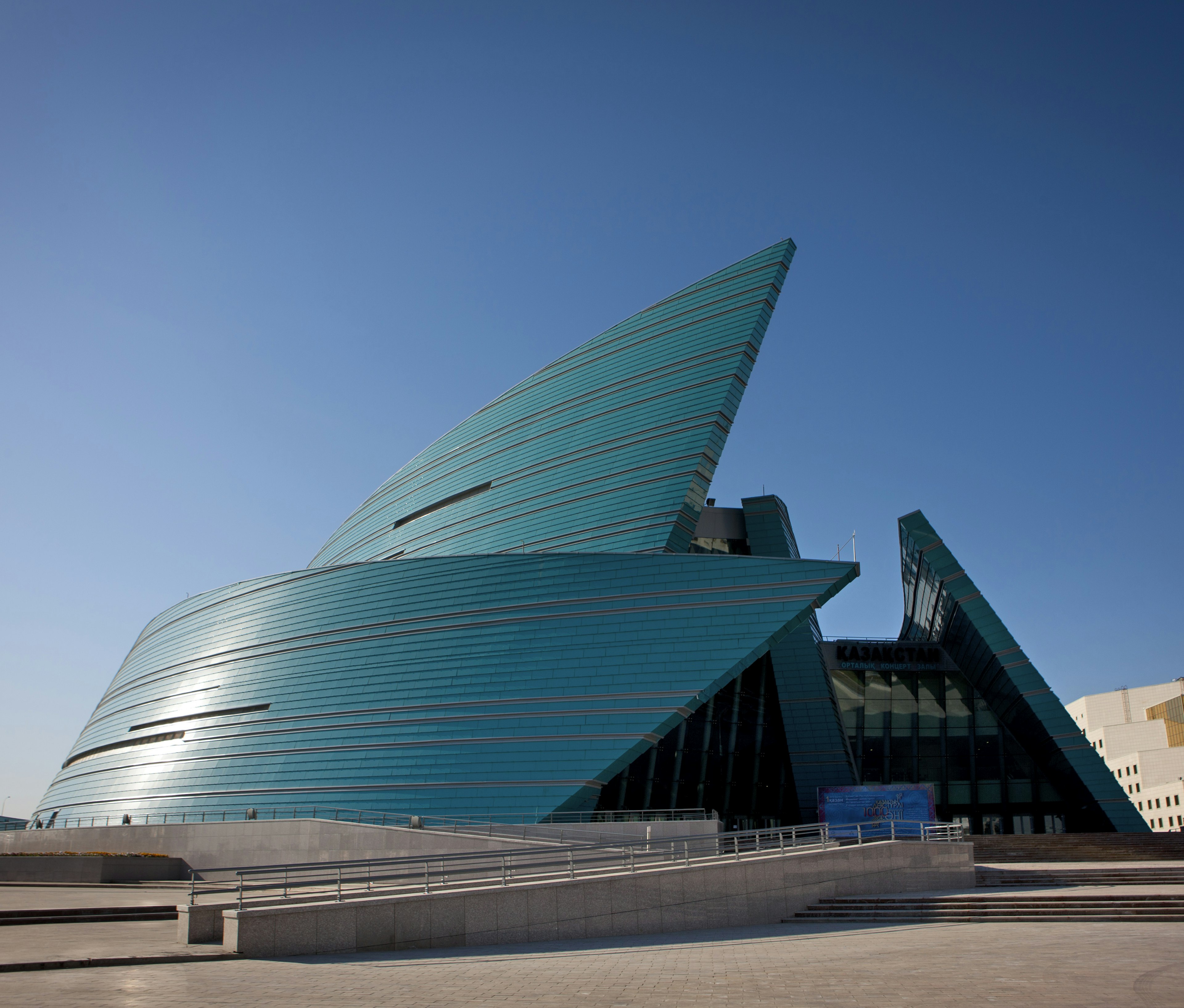 Modern architecture of Central Concert Hall near Ak Orda Presidential Palace.