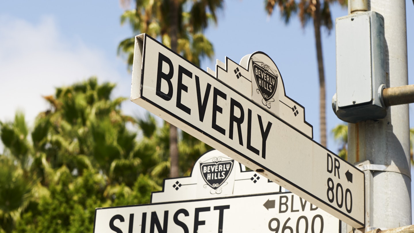 Street signage at the crossing of Sunset Boulevard and Beverly Drive.