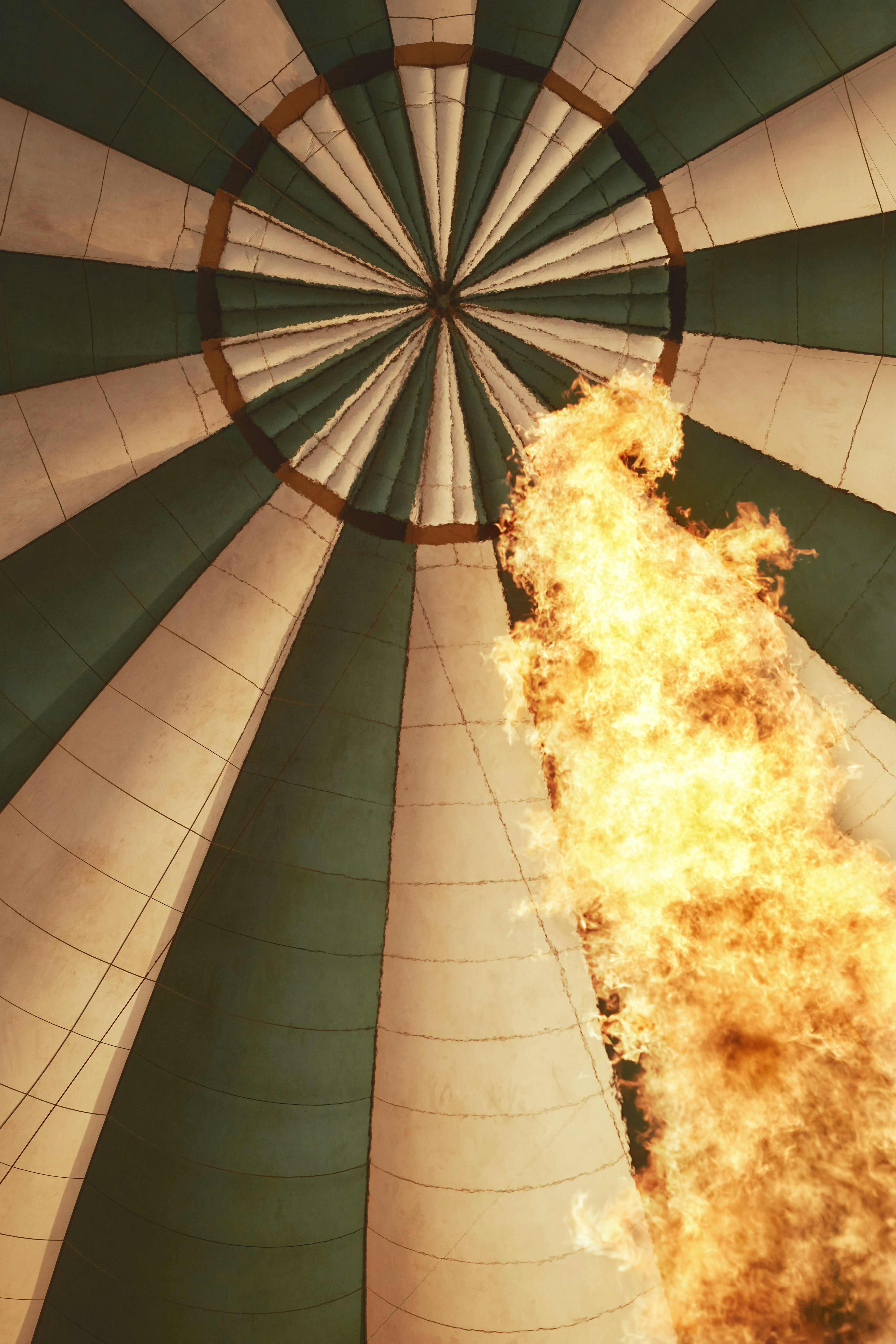 A blast of flame generates heat for an air balloon ride over the Serengeti.