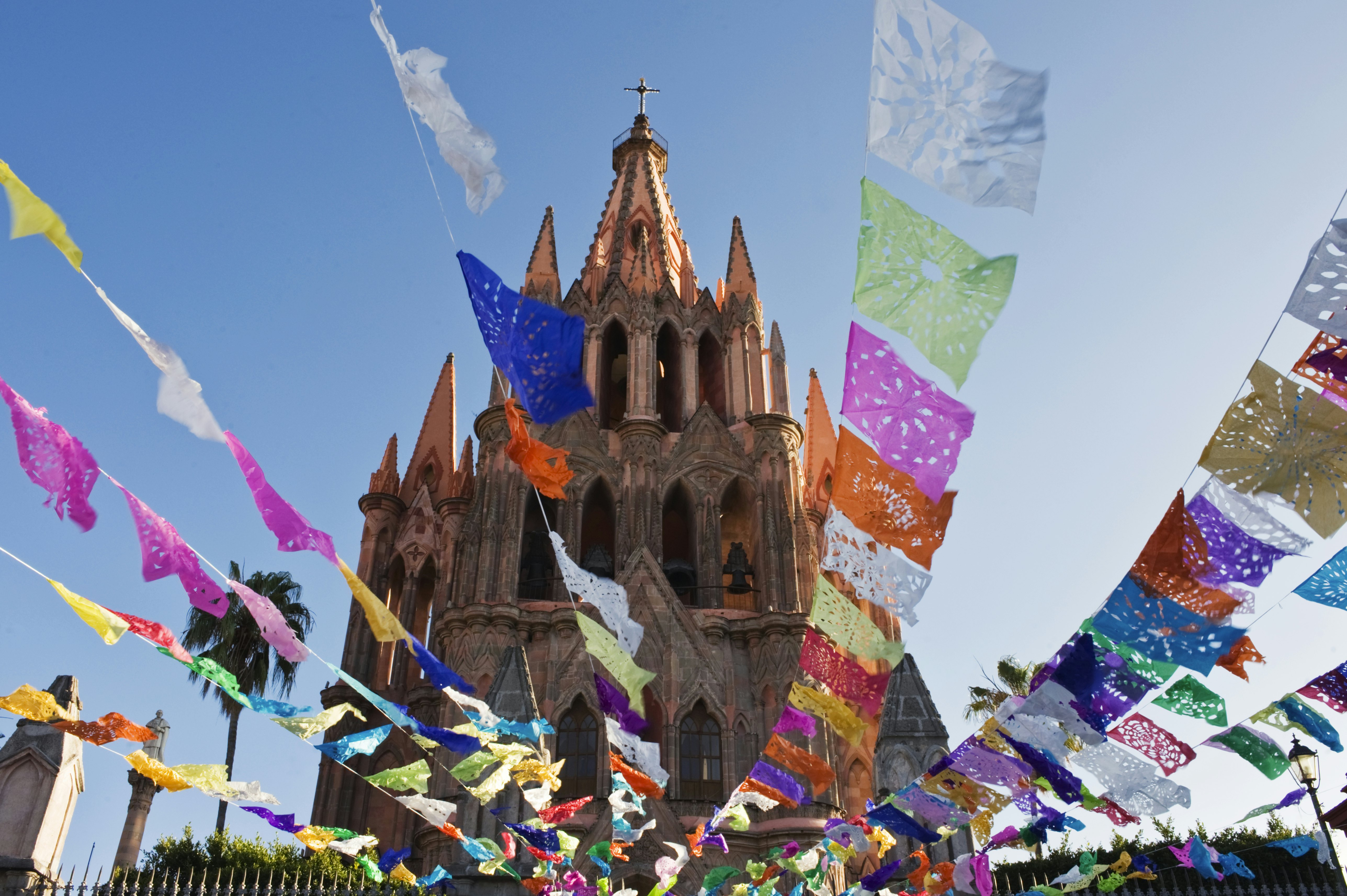 Mexico, Guanajuato, San Miguel de Allende, Parroquia De San Miguel Archangel Church Tower with Day of the Dead Banners