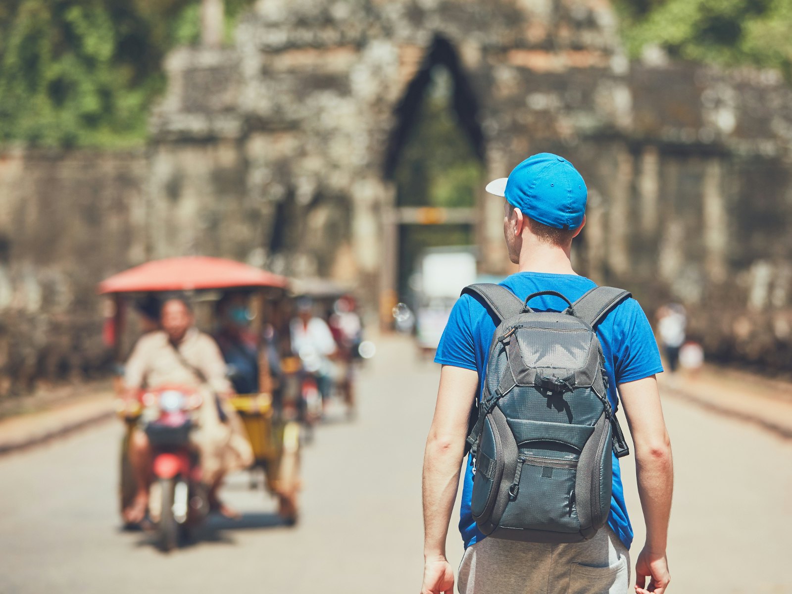 Young male traveller with a backpack in Siem Reap.