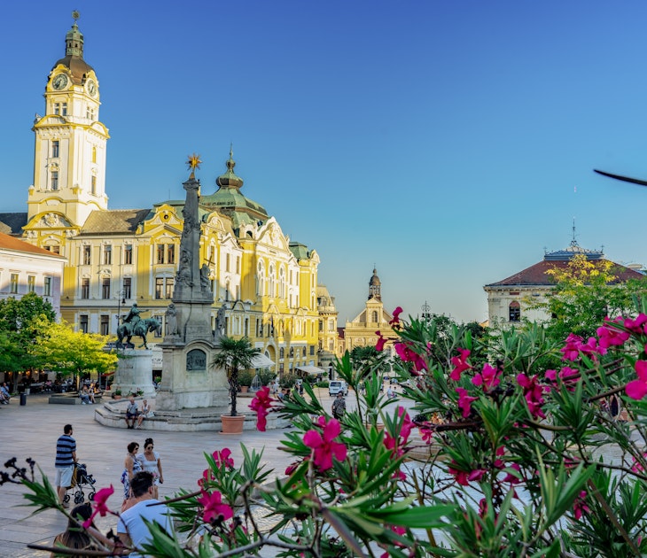 Pecs, Hungary - 21.08.2020: the main square in Pécs Hungary with flowers License Type: media Download Time: 2023-02-22T22:33:32.000Z User: mvm_lonelyplanet Is Editorial: Yes purchase_order: