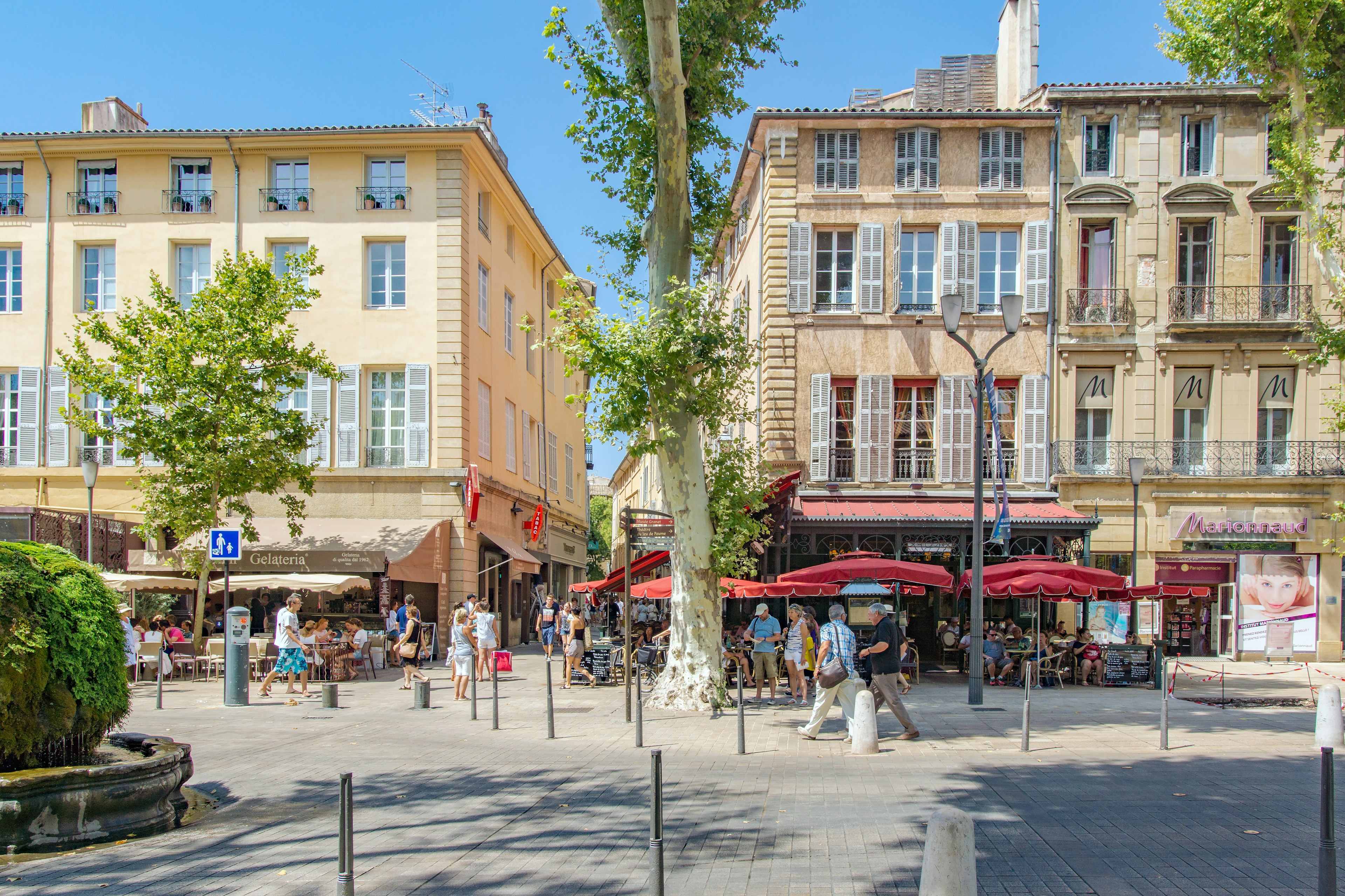 Aix-en-Provence, Provence, France. July 2014. People wandering the streets and squares of Aix-en-Provence.