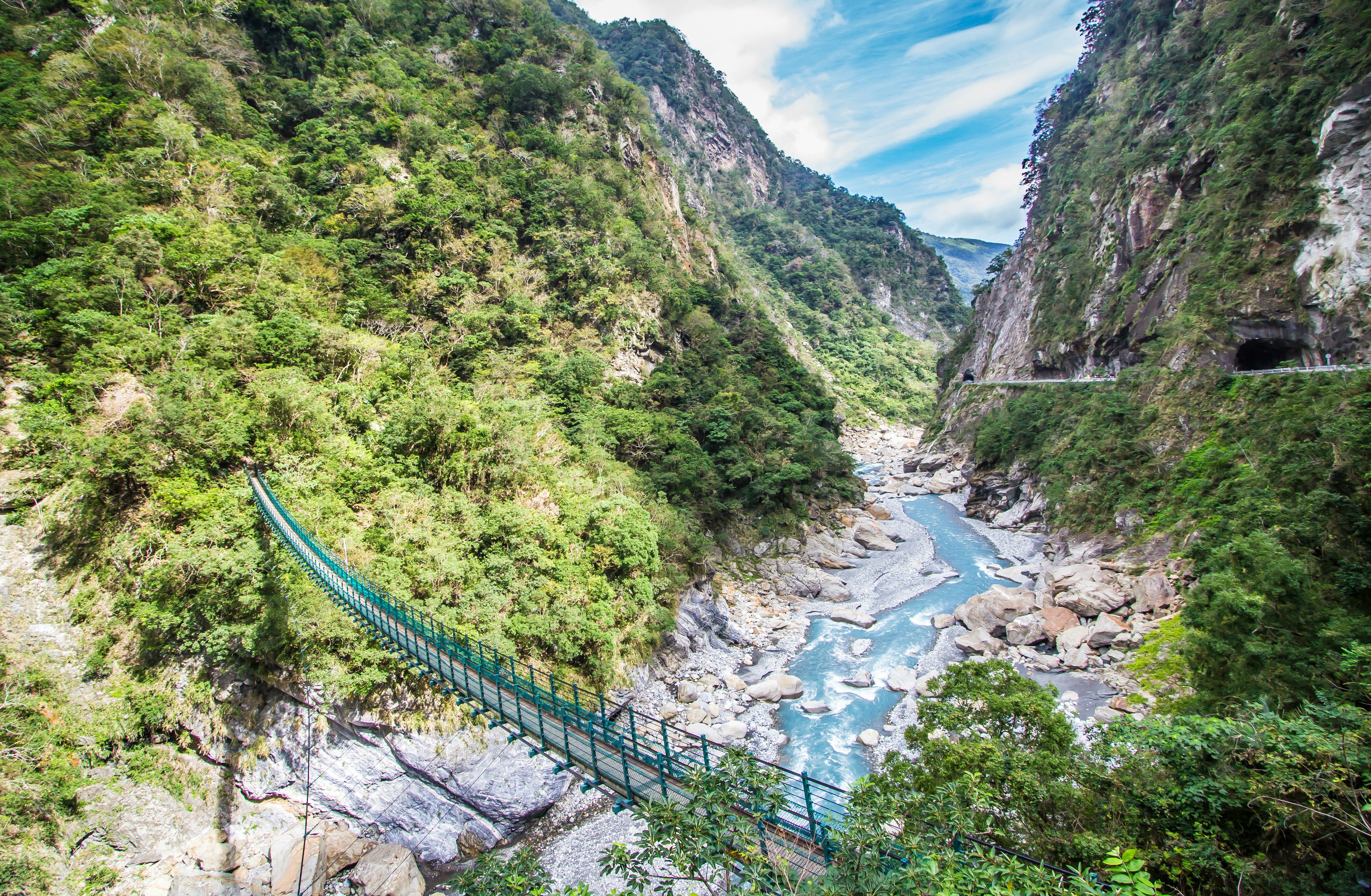 A bridge connects two points across Taroko Gorge in Taiwan.