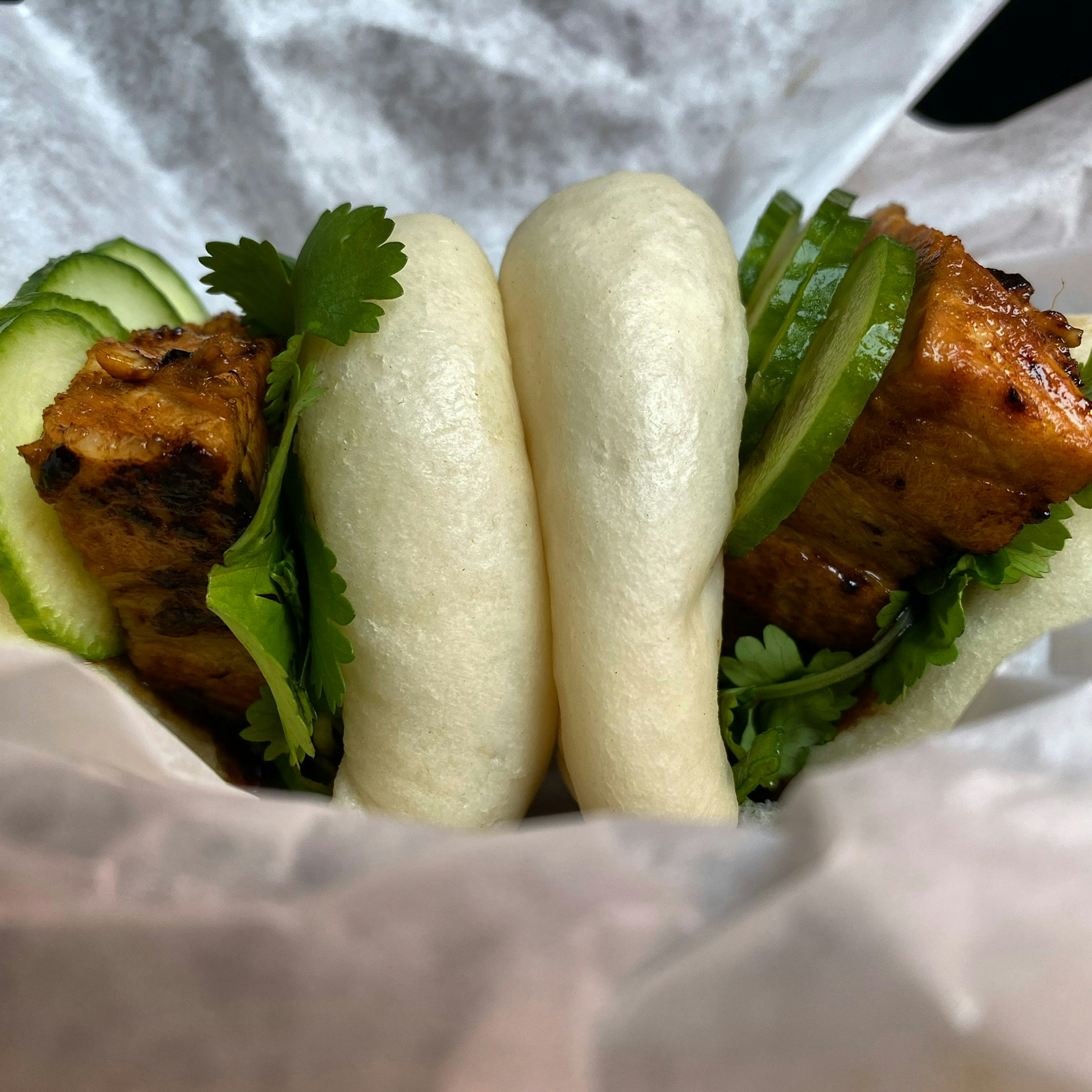 A pork bun at Satay Brothers in Montréal, Canada