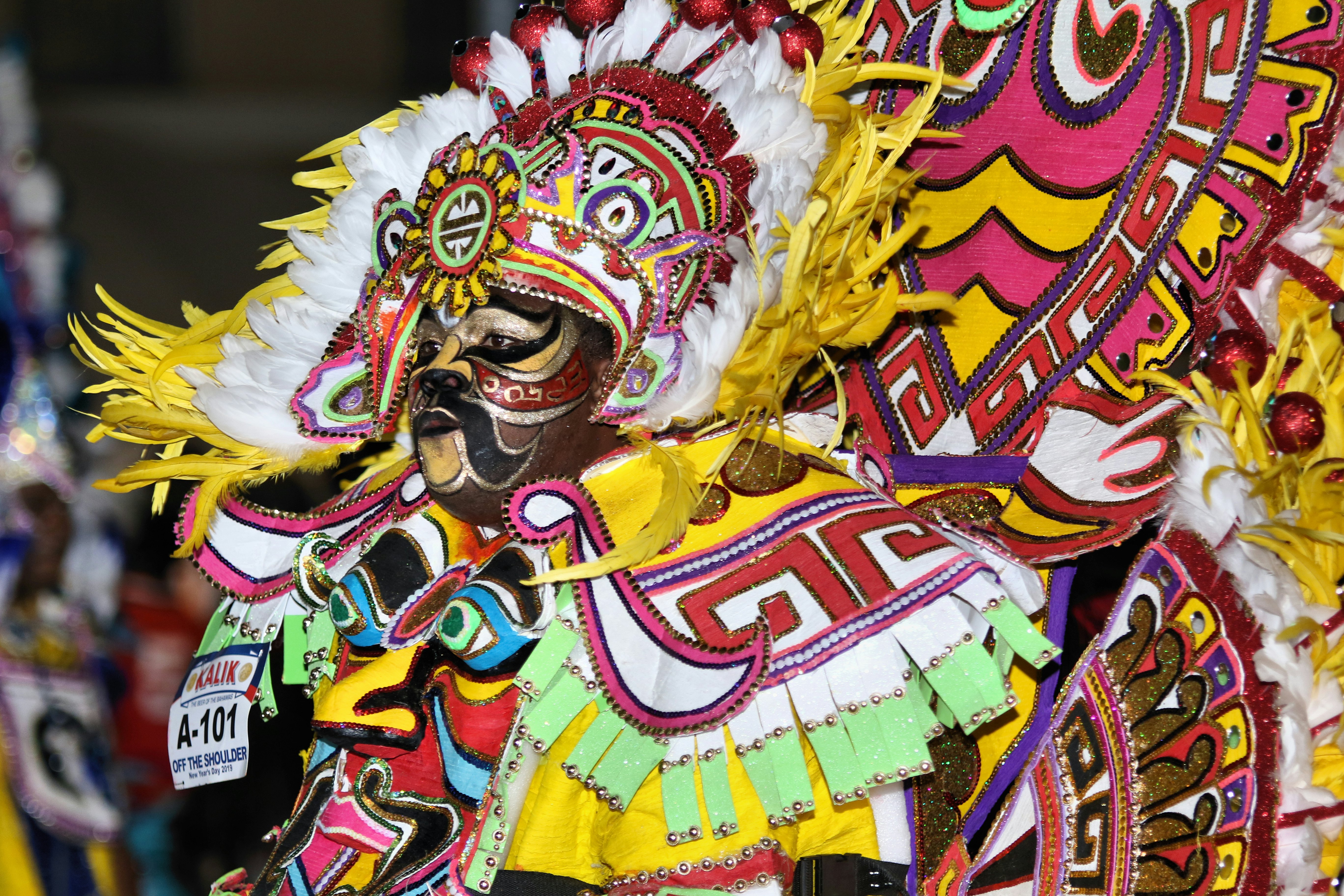 Man in a lavish costume at the Boxing Day Junkanoo Parade in downtown Nassau, Bahamas.