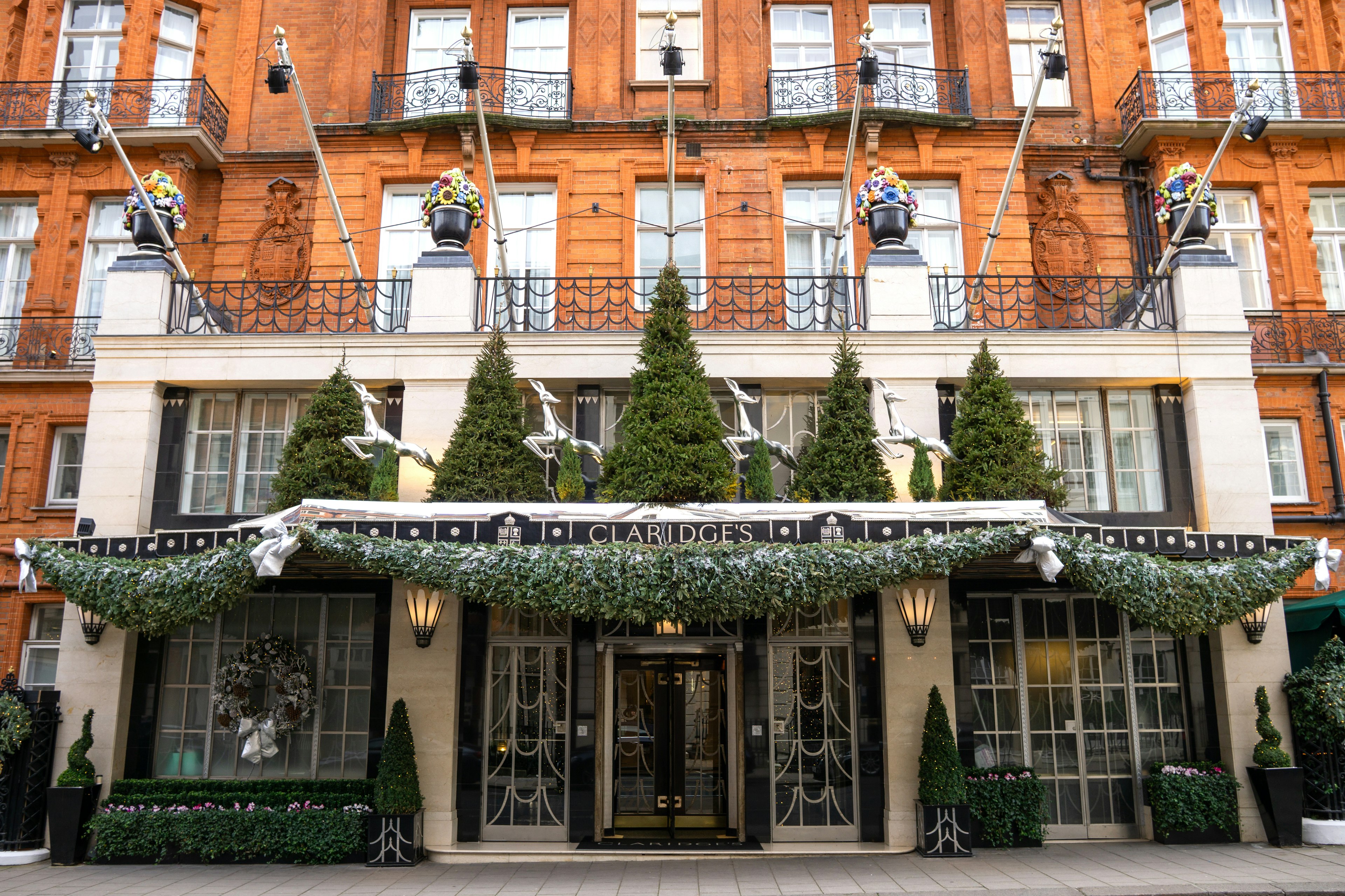 Exterior of a five-star hotel covered in Christmas decorations