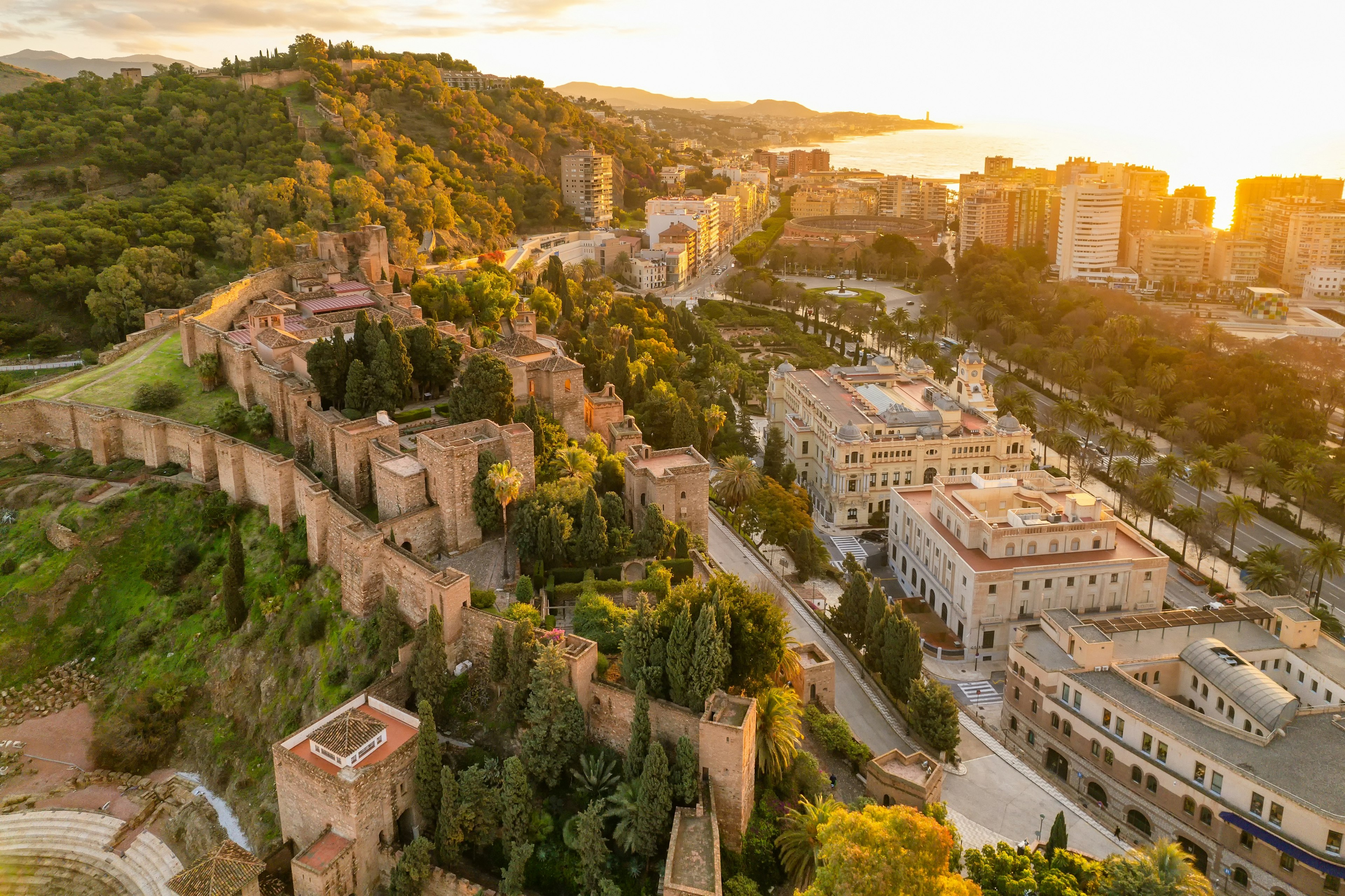 Aerial view of the medieval Moorish castle of Alcazaba at sunrise in Malaga, Spain.