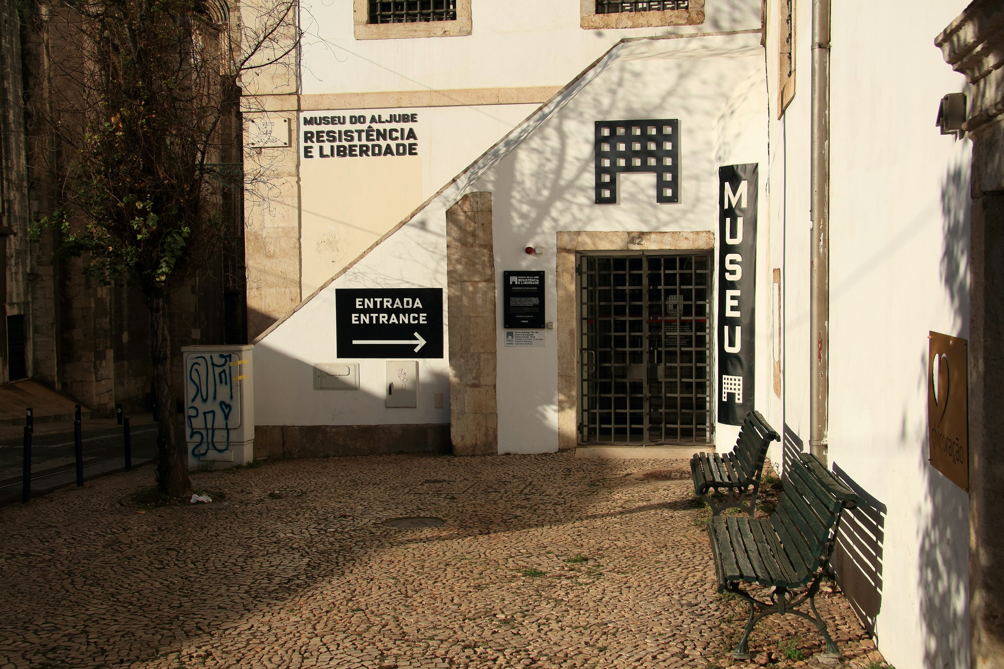 The gated entrance to a prison building, now a museum