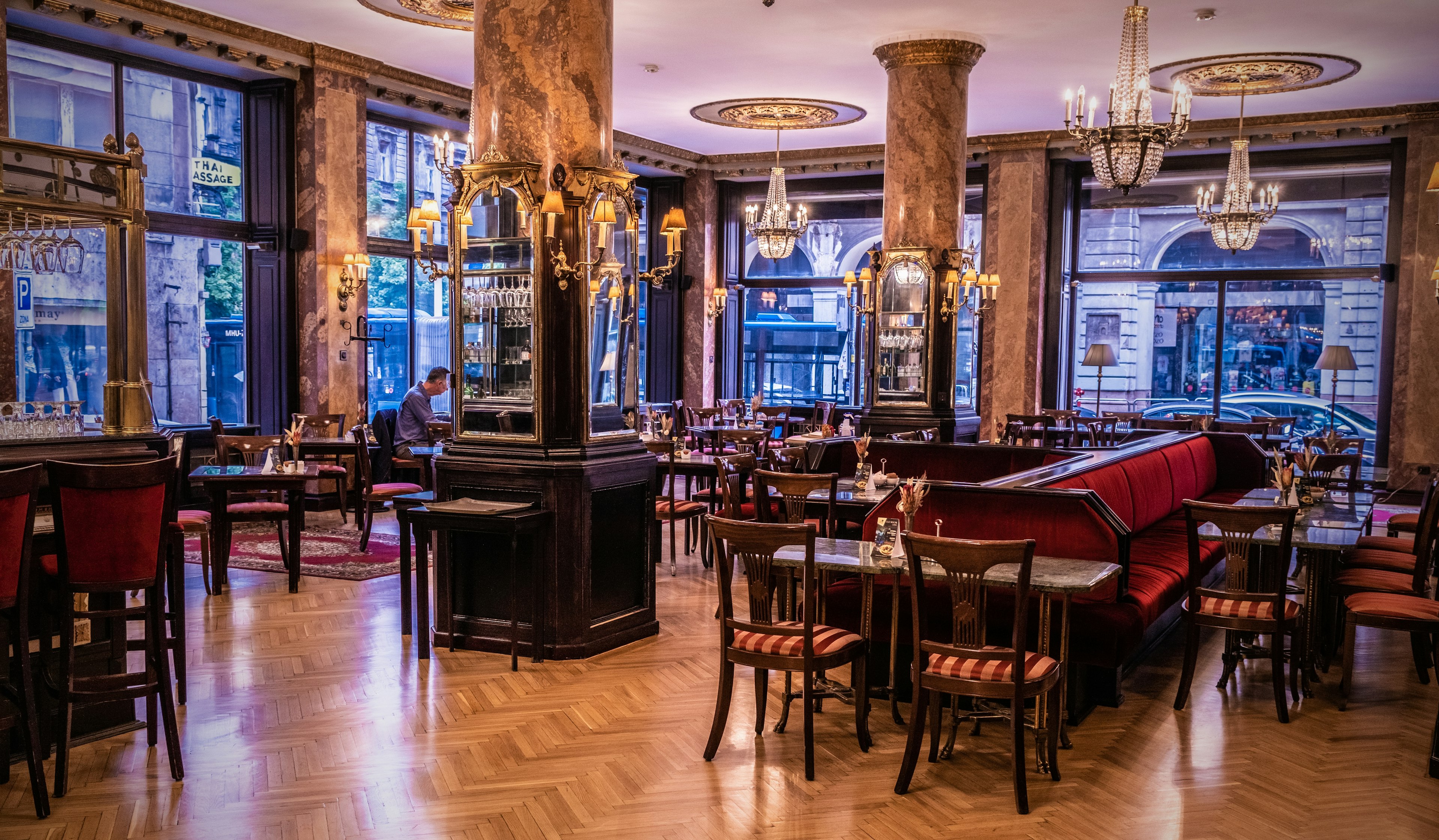 Interior of Astoria Cafe, Budapest with its red velvet seats