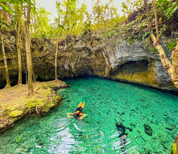 Woman swimming in Tulum Cenotes That Are Worth a Visit, Cenotes around tulum and playa del carmen that deserve a visit at least once. Mexico world tourist place, License Type: media_digital, Download Time: 2024-11-07T13:25:52.000Z, User: clairenaylor, Editorial: false, purchase_order: 65050 - Digital Destinations and Articles, job: Online editorial, client: Cenotes Tulum, other: Claire Naylor