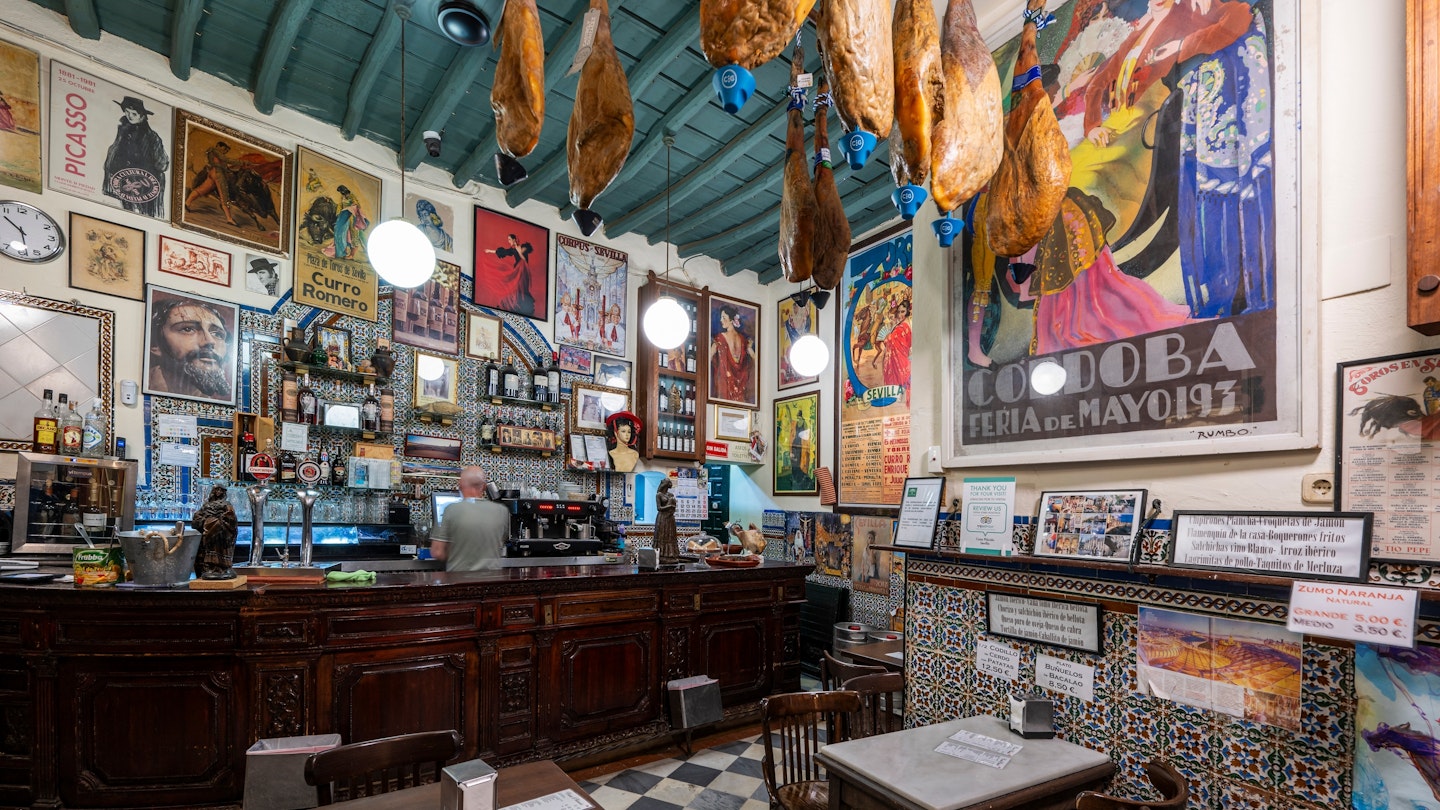 Seville, Andalusia, Spain - June 20, 2024: Old bar in Santa Cruz district, License Type: media, Download Time: 2024-10-03T05:38:15.000Z, User: claramonitto, Editorial: true, purchase_order: 56530, job: Global Publishing-WIP, client: Experience Andalusia 2, other: Clara Monitto