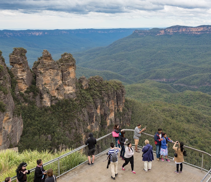 Blue Mountains, Australia - May 1, 2016: People at observation deck at Echo point lookout with view of famous Three Sisters mountains and Blue Mountains eucalyptus forest; Shutterstock ID 646238473; purchase_order: 65050 - Digital Destinations and Articles; job: Lonely Planet Online Editorial; client: Day trips from Sydney; other: Brian Healy
646238473
australia, australian, beautiful, blue mountains, destination, echo point, eucalyptus, famous, forest, katoomba, landmark, landscape, lookout, mountain, nature, new south wales, nsw, observation deck, panorama, panoramic, people, place, popular, real people, three sisters, tourism, tourist, travel, travel destination, view
People at observation deck at Echo point lookout with view of famous Three Sisters mountains and Blue Mountains eucalyptus forest
