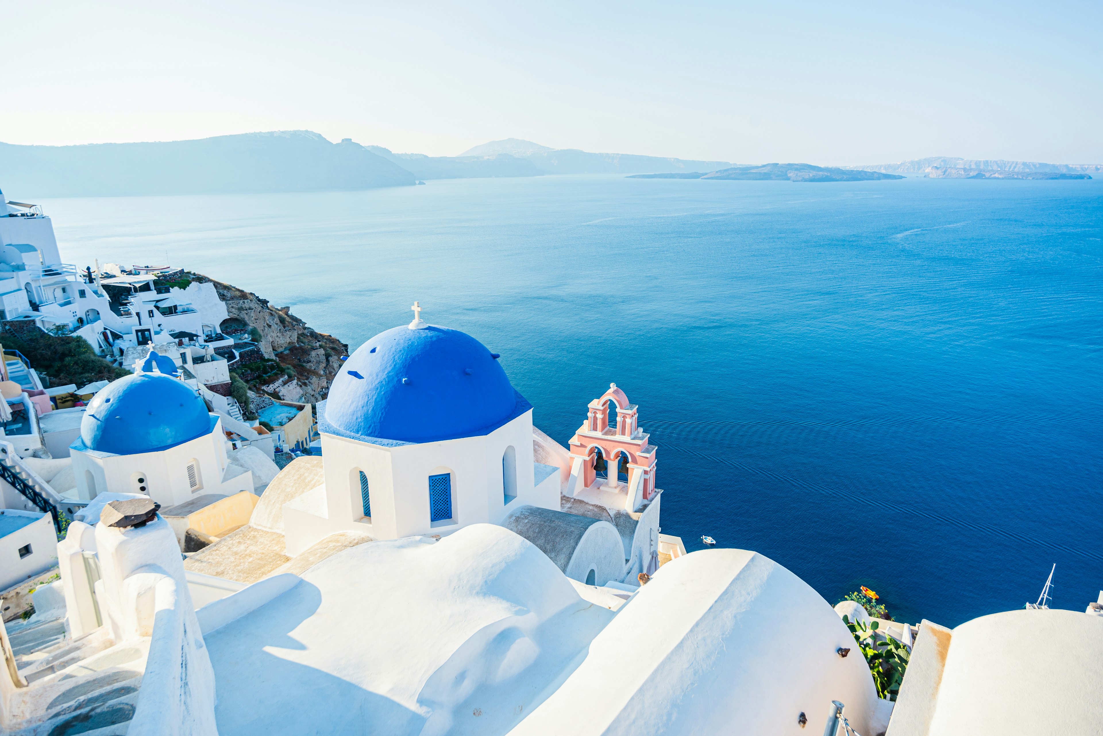 Blue dome churches in Oia during the morning.