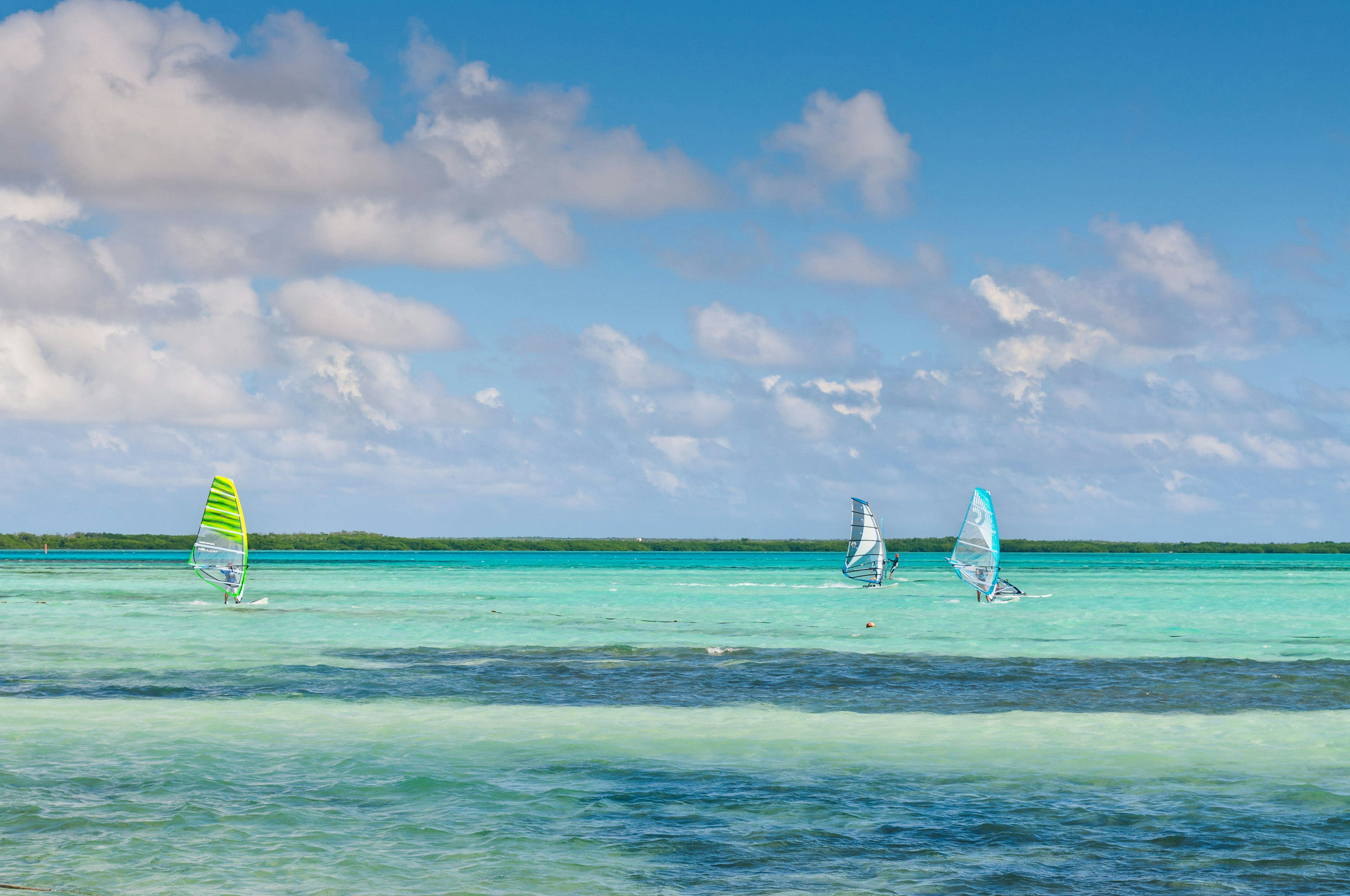 Windsurfers on the lagoon at Lac Bay, near Sorobon beach.