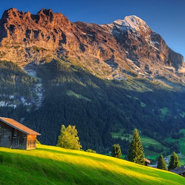 A mountain hut under the shadow of the Eiger mountain in Switzerland