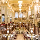 December 9, 2014: New York Cafe inside the New York Palace hotel in Budapest.
492702319
decoration, cafe, destination, table, leisure, travel, budapest, day, new, drink, urban, culture, landmark, restaurant, light, old, york, traditional, building, hungary, architecture, city, interior, inside, tourism, scene, indoor, europe