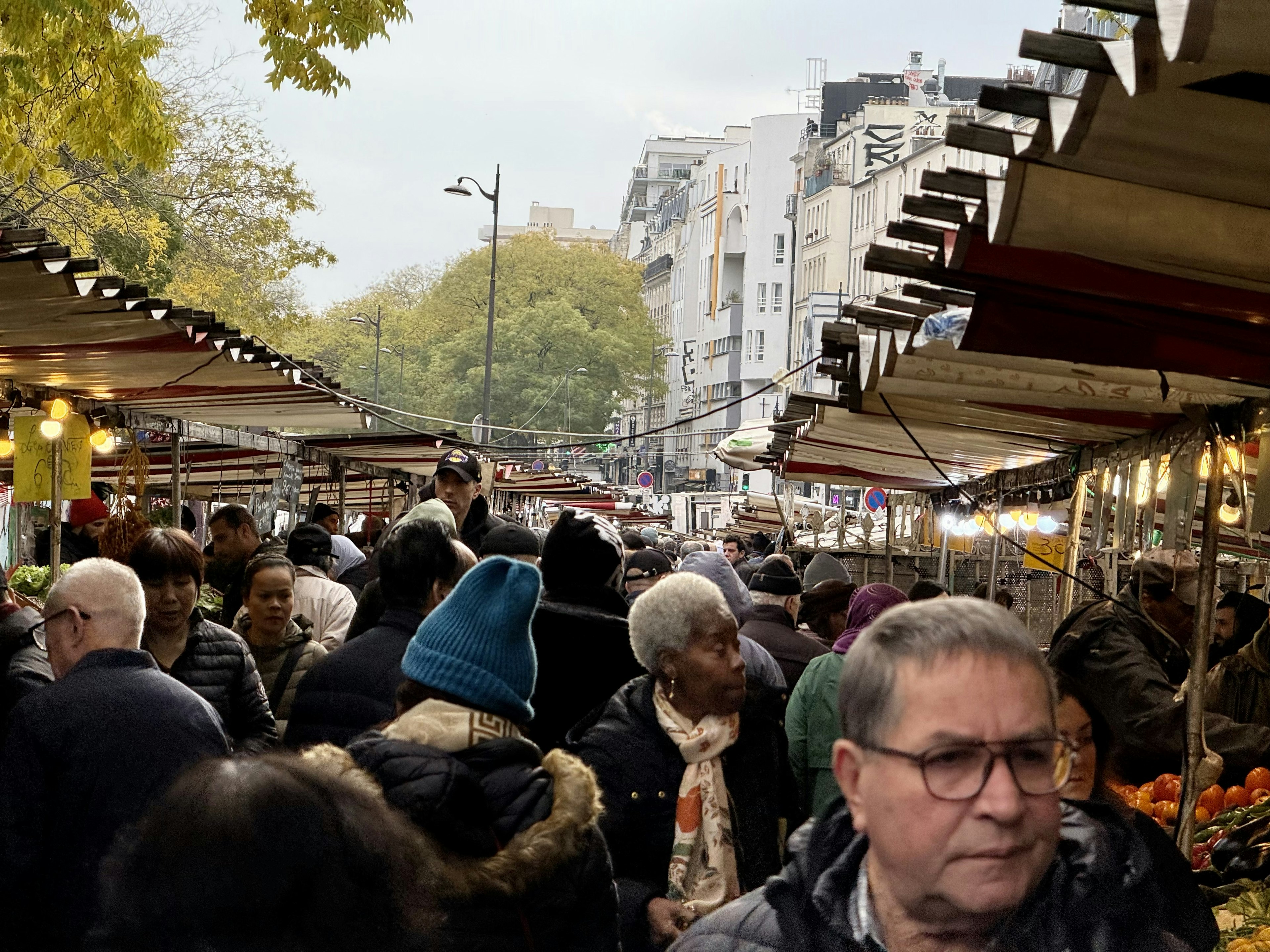 Shoppers at Belleville Market. Peter Yeung for Lonely Planet