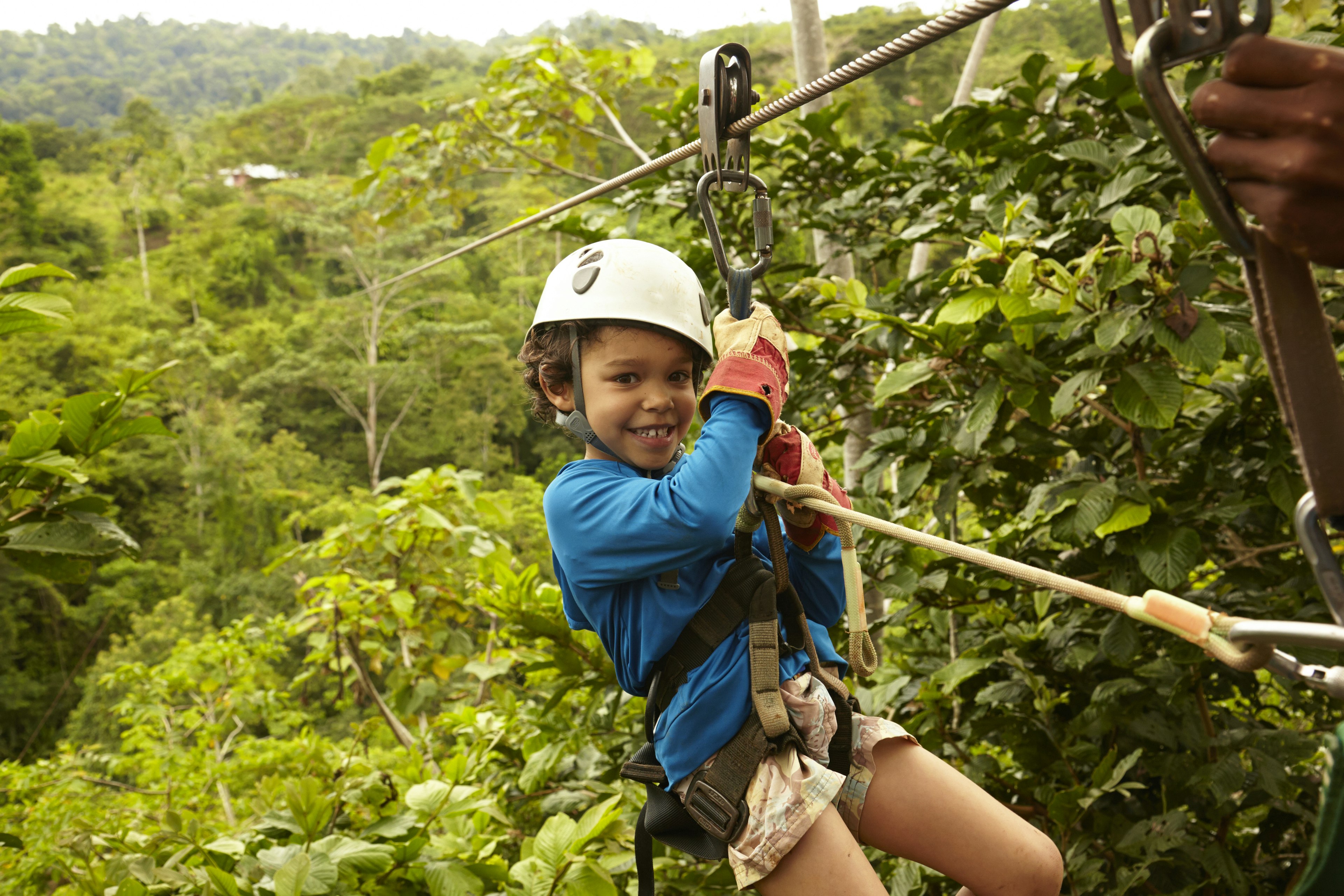 Young boy on a zipline