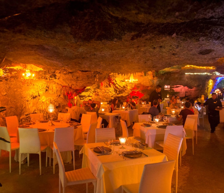 MEXICO - 2017/04/21: The colorful Alux Restaurant, a Cavern Restaurant, in Playa del Carmen near Cancun along the east coast of the Yucatán Peninsula on the Caribbean Sea in the state of Quintana Roo, Mexico. (Photo by Wolfgang Kaehler/LightRocket via Getty Images)
MEXICO - 2017/04/21: The colorful Alux Restaurant, a Cavern Restaurant, in Playa del Carmen near Cancun along the east coast of the Yucatán Peninsula on the Caribbean Sea in the state of Quintana Roo, Mexico. (Photo by Wolfgang Kaehler/LightRocket via Getty Images)
909616068
2017, North America, NORTH AMERICAN, Mexican, Mexico, LATIN AMERICA, LATIN AMERICAN, Hispanic, YUCATAN PENINSULA, YUCATAN, RIVIERA MAYA, PLAYA DEL CARMEN, Restaurant, CENOTE, cavern, colorful, colorful lights, dining, STALACTITE, STALAGMITE
The colorful Alux Restaurant in Playa del Carmen