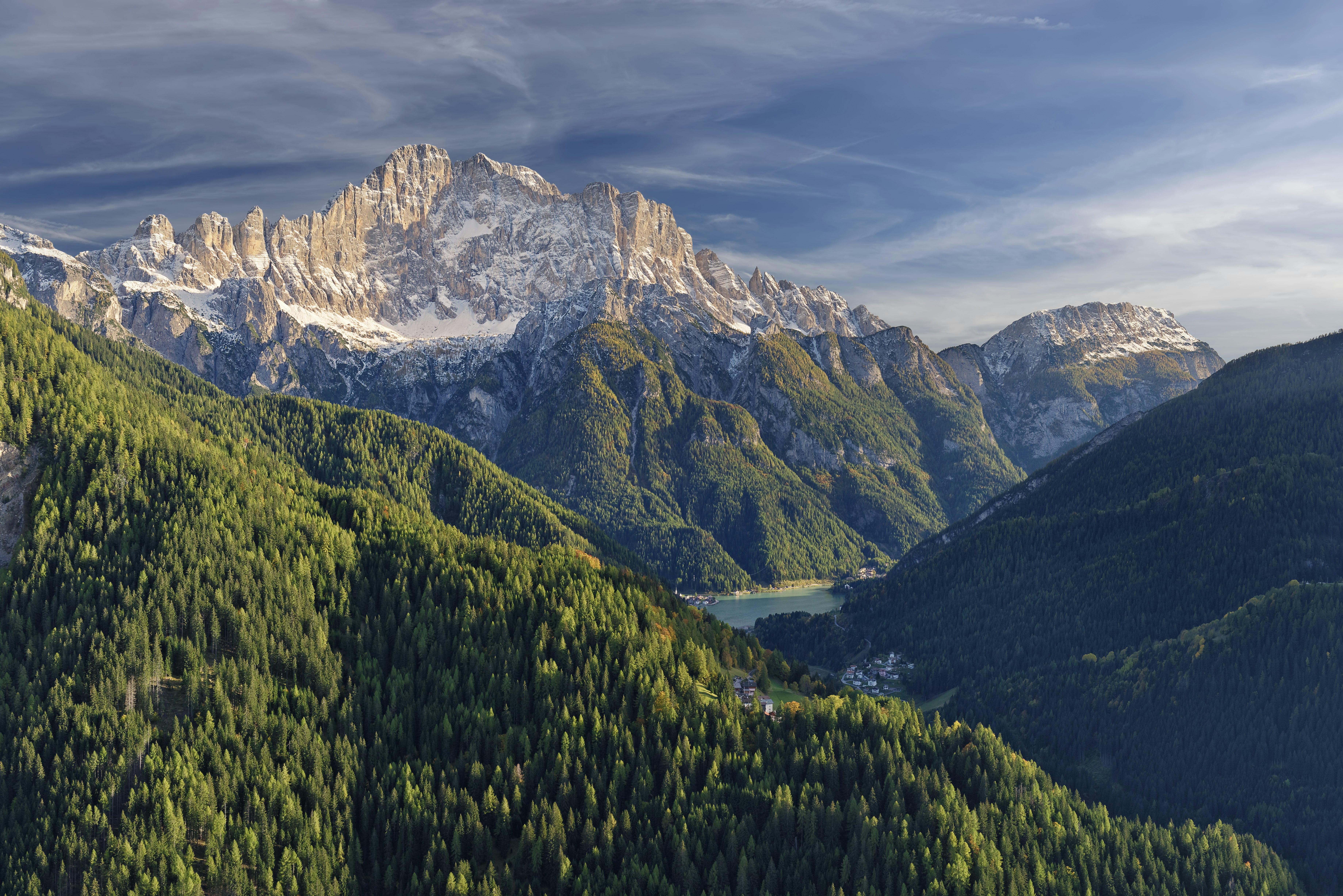 Lake of Alleghe dominated by the vertical face of Mount Civetta (Dolomites - Italy)