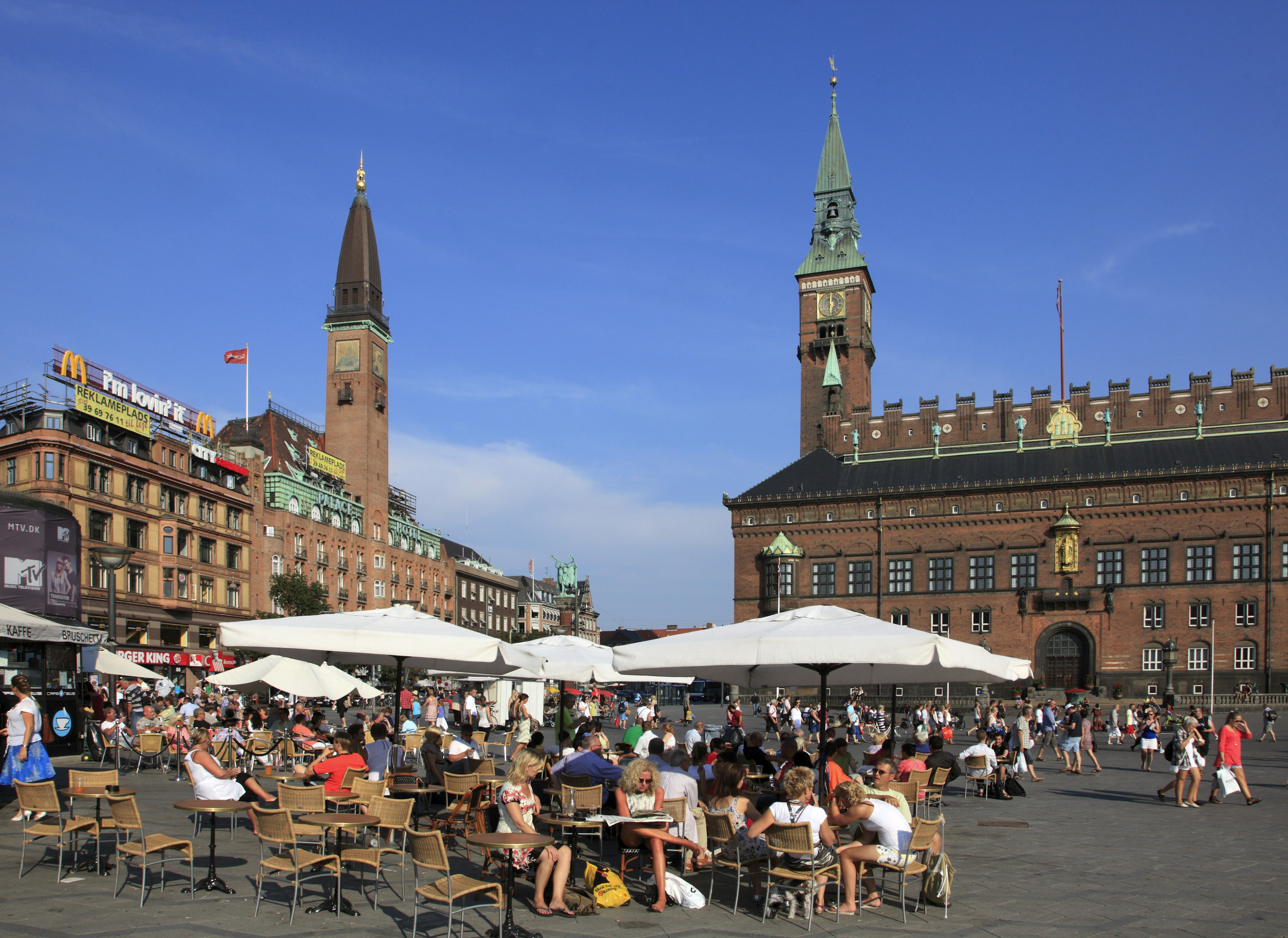 Visitors gathered at tables in City Hall Square.