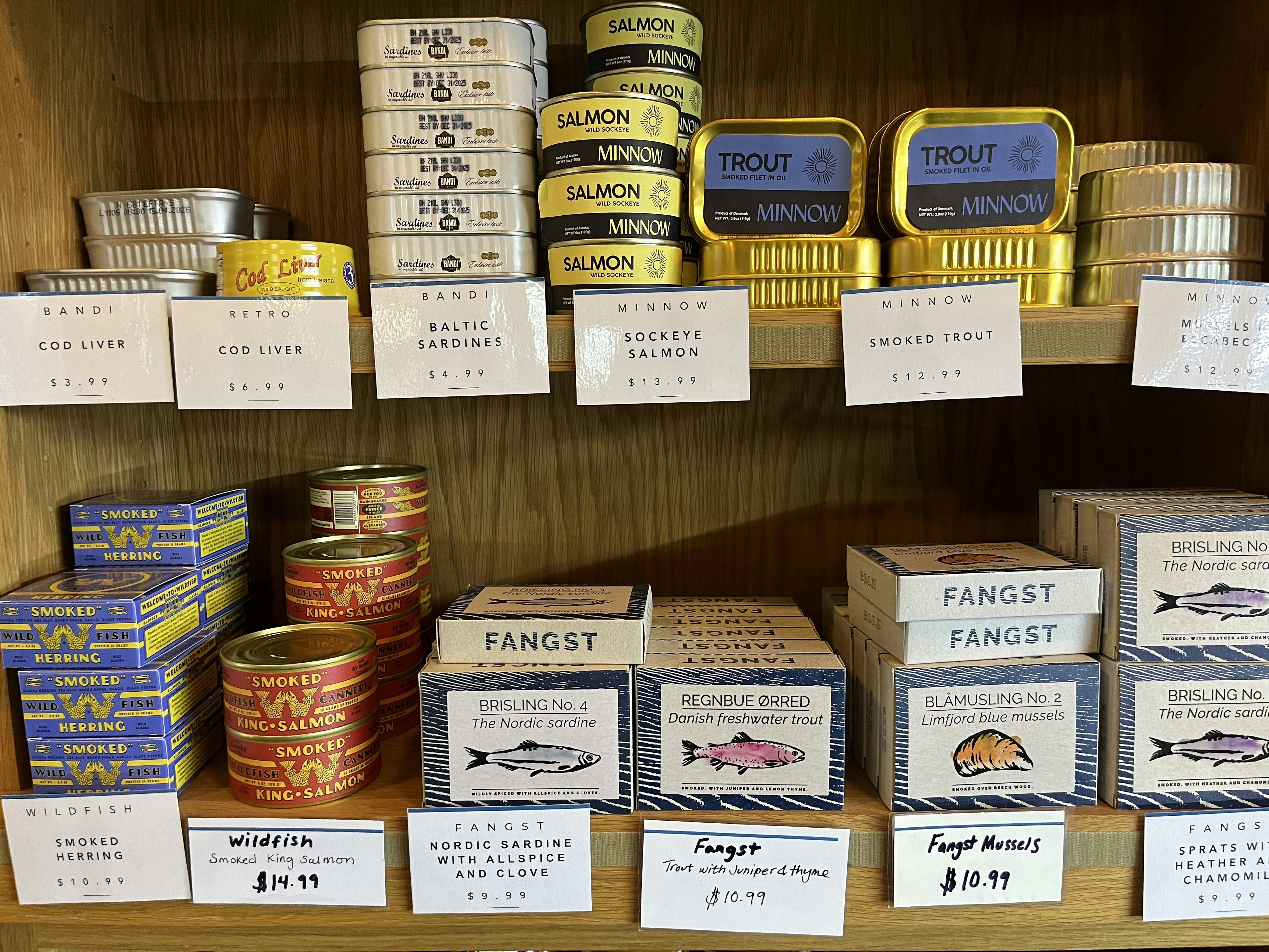 Tinned fish and other speciality foods for sale at independent food market Kachka Lavka in Portland, OR