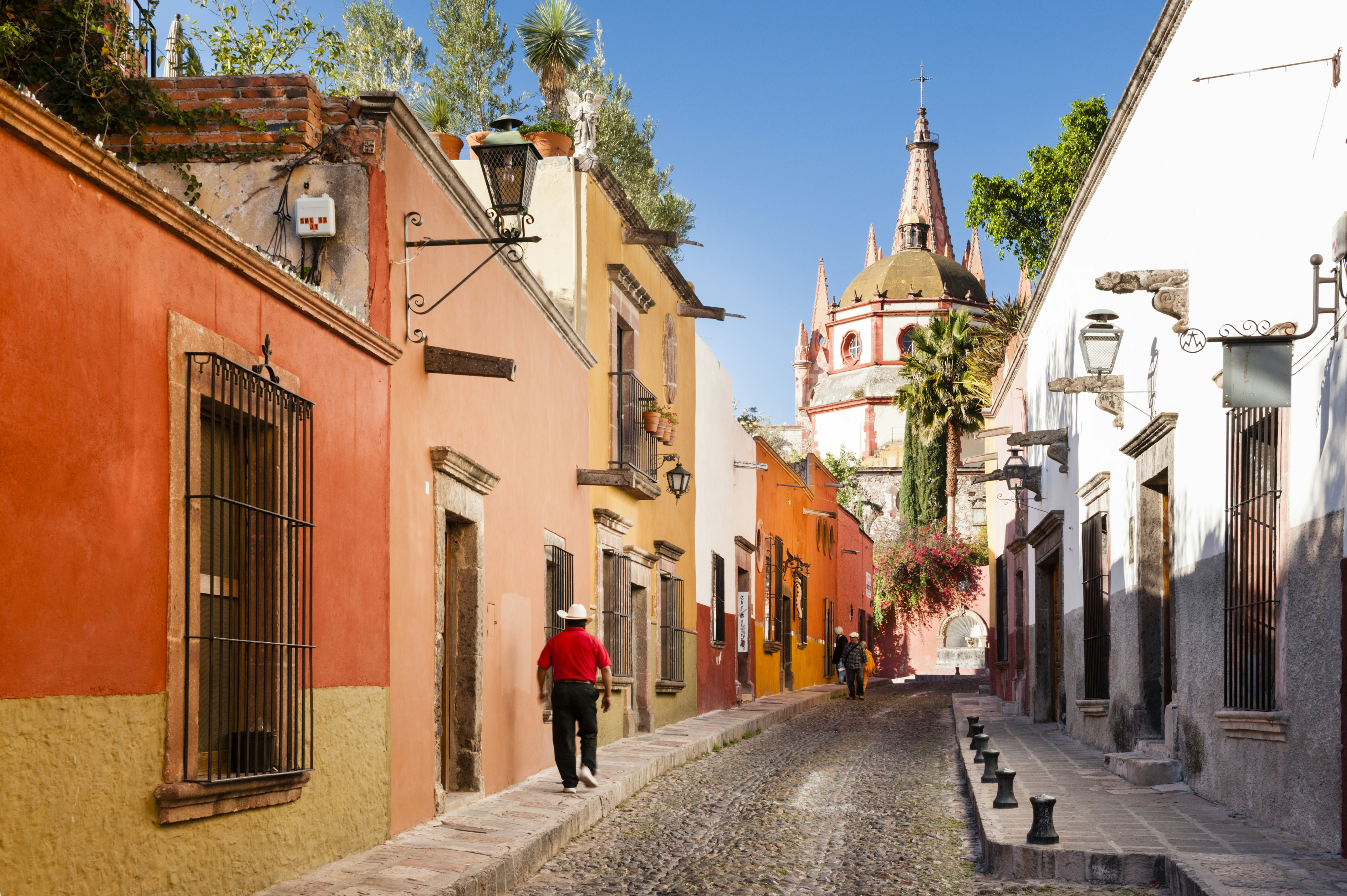 Issue 67, Lonely Planet Traveller Magazine, Great Escape Mexico
Man walking down a cobblestone street with chuch dome in distance.