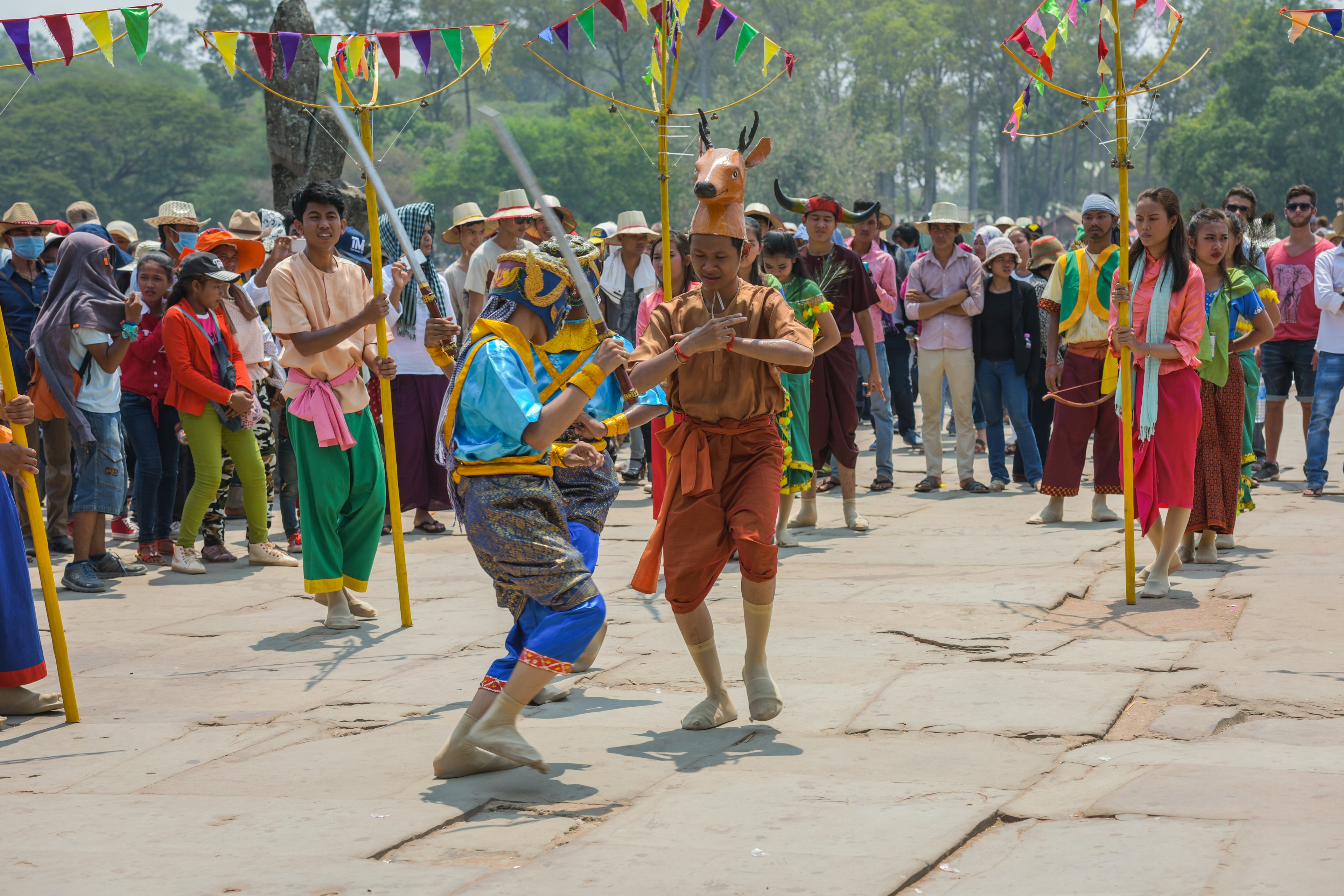 Dancers perform a traditional Khmer dance in front of Angkor Wat during the Khmer New Year celebrations.