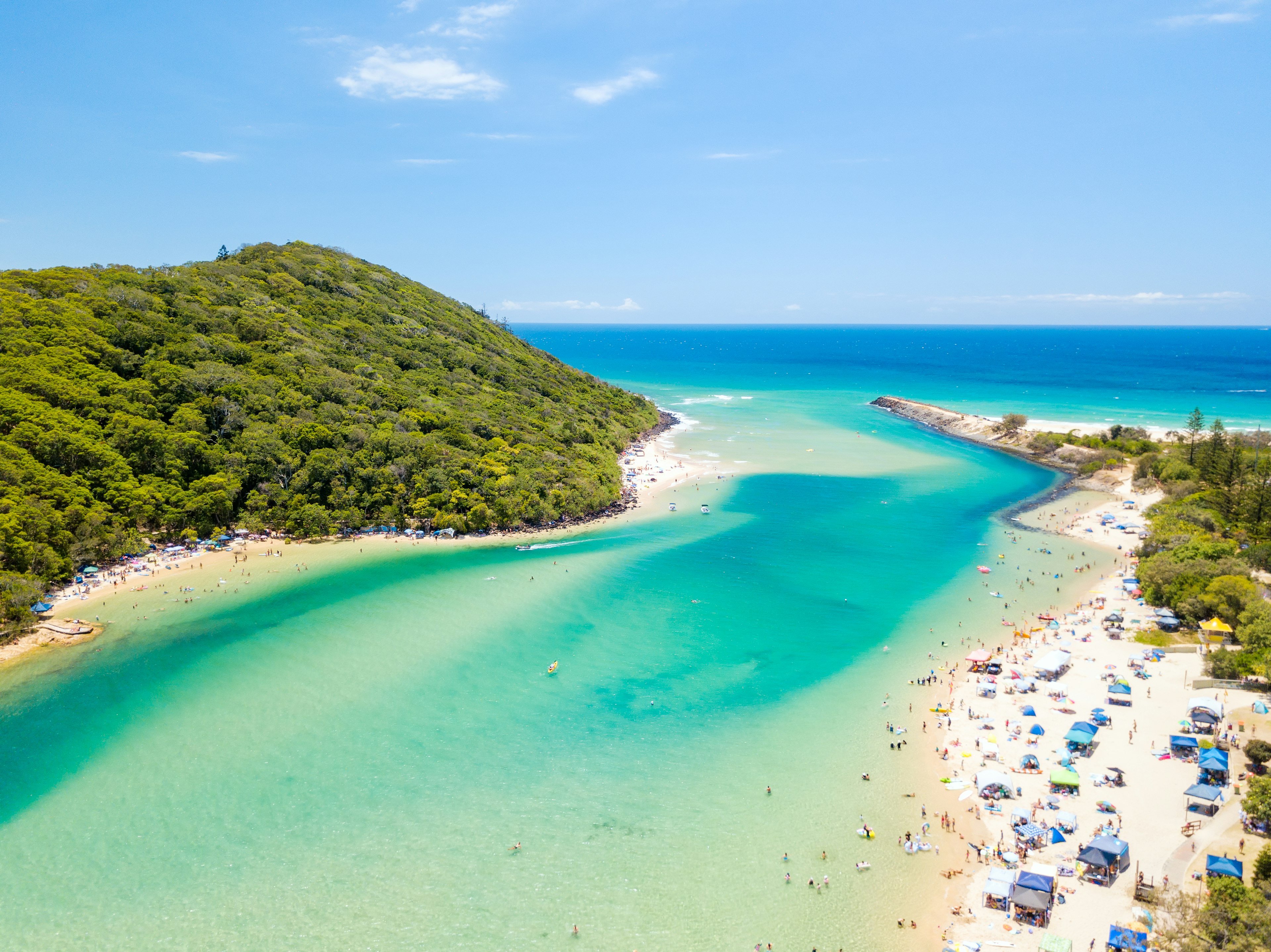 Tallebudgera Creek on a sunny day with blue water on the Gold Coast in Queensland.