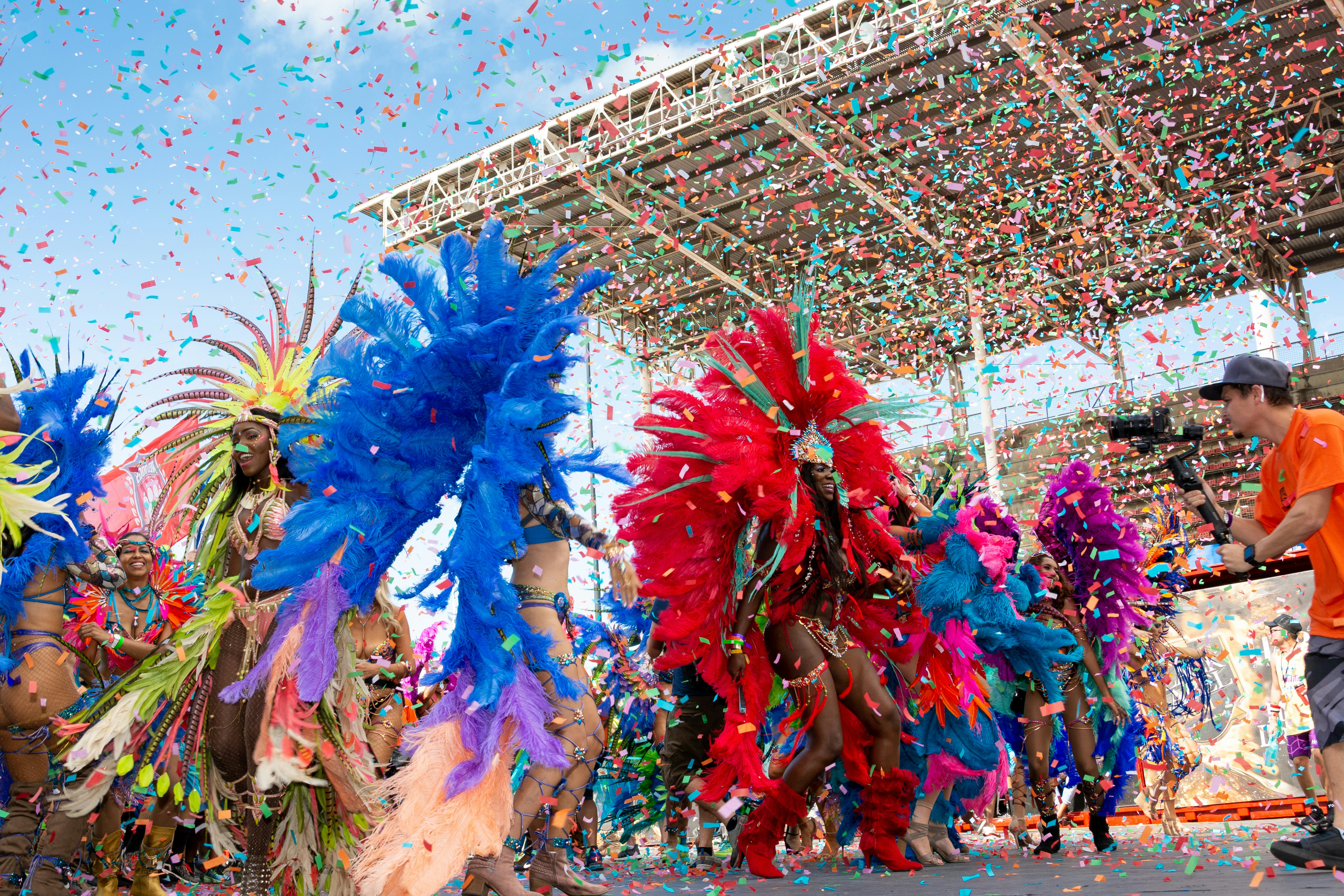 Masqueraders in feathered costumes at the Harts Carnival in Port of Spain, Trinidad.