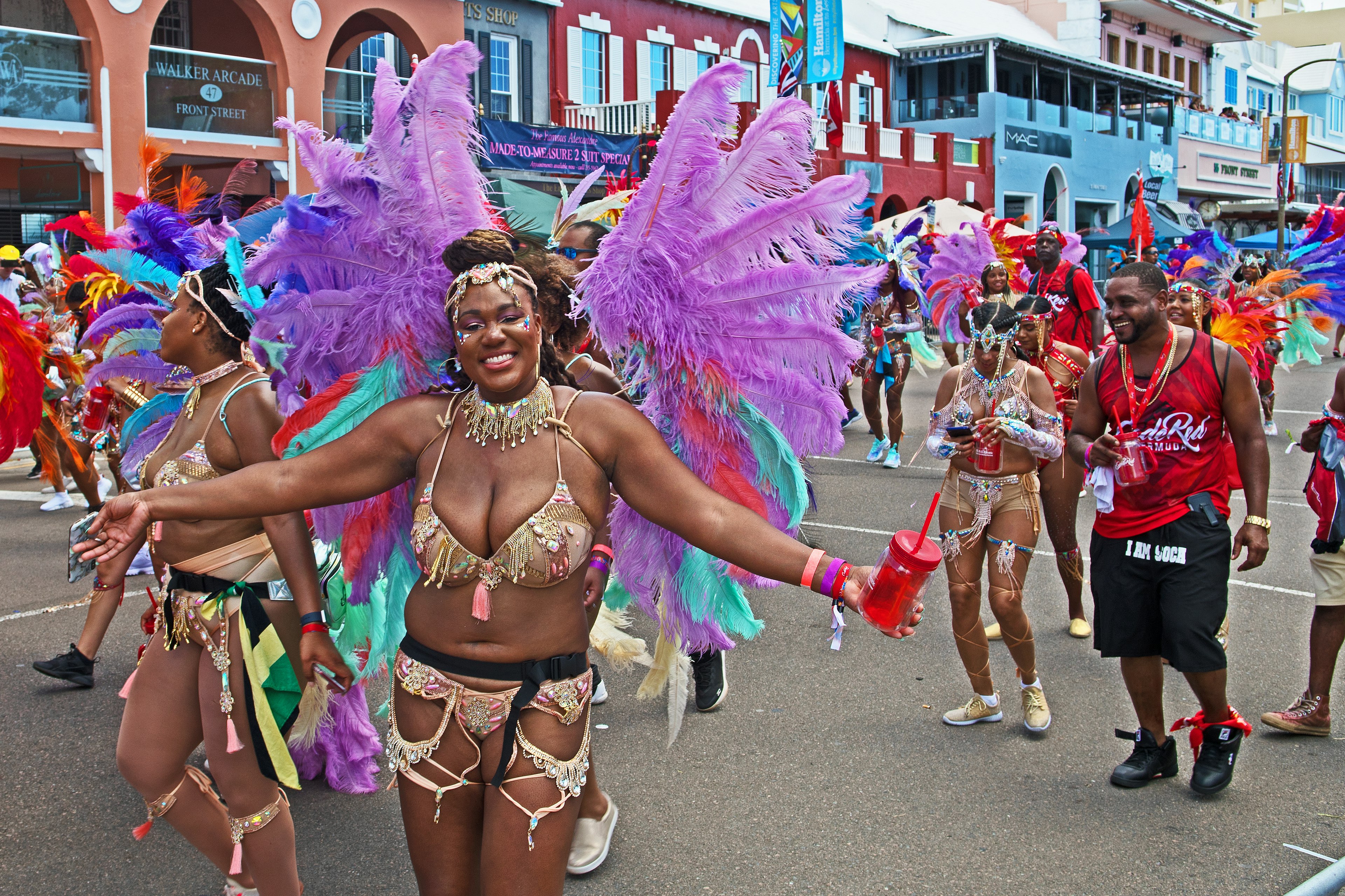 The Bermuda Carnival on Heroes Day featured, for the first time, a parade along Hamilton's Front Street with revelers wearing brightly colored costumes and feathers.