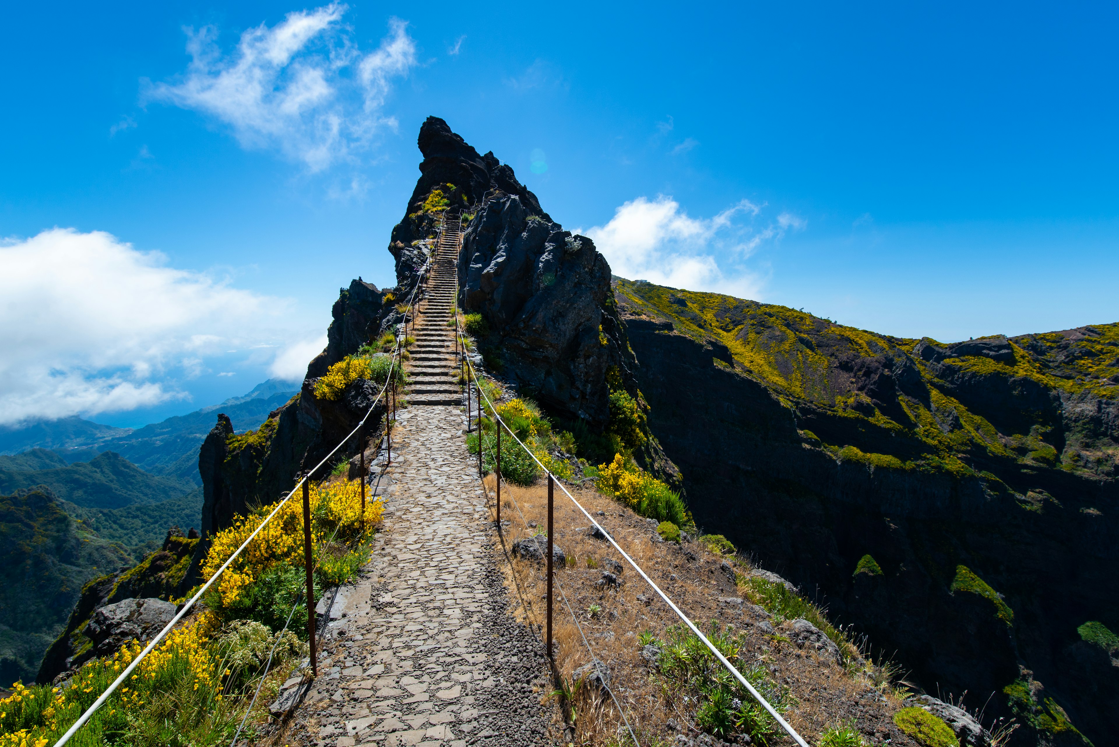 Trekking from Pico do Arieiro to Pico Ruivo in Madeira island, Portugal, Europe.