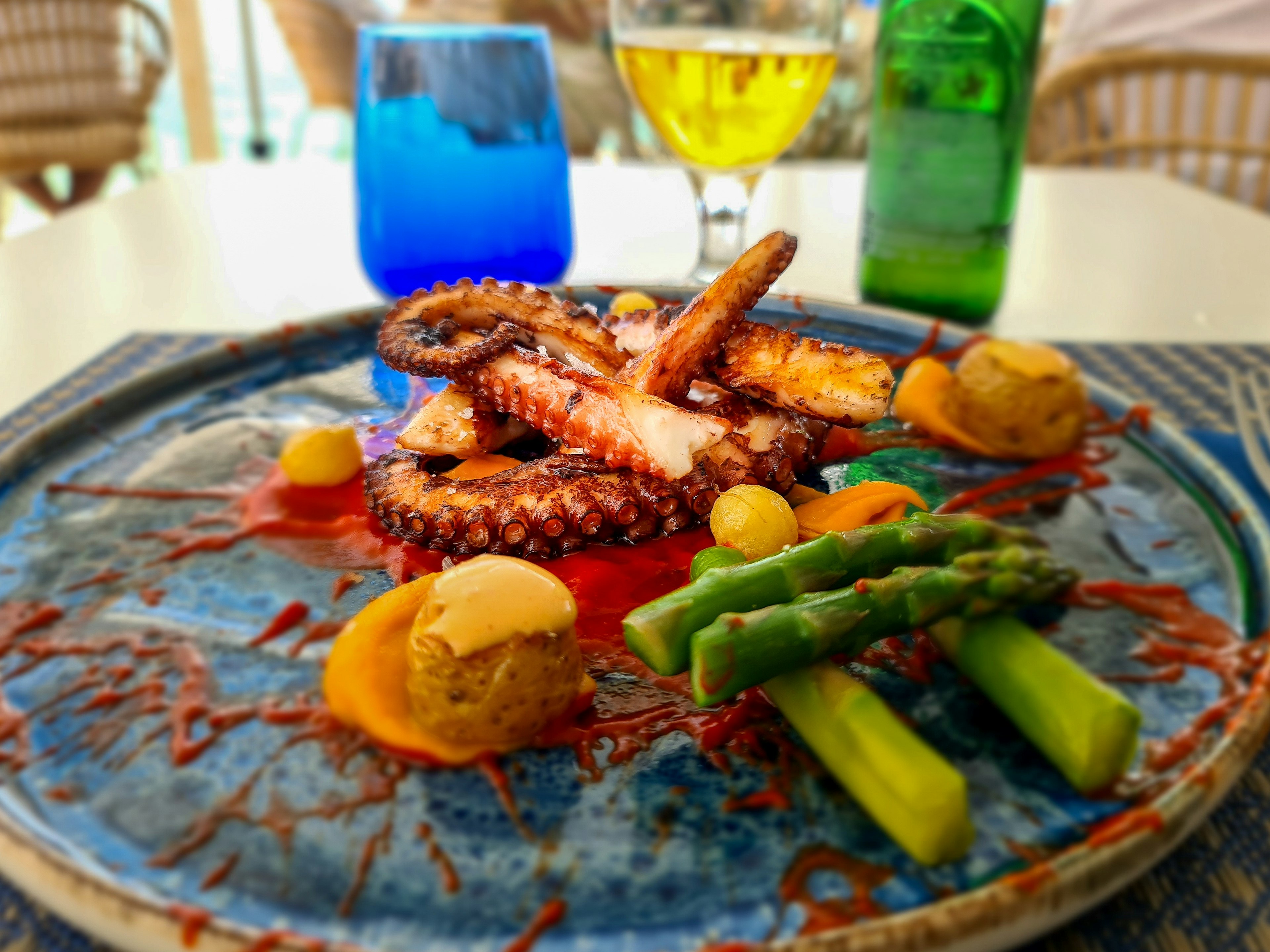 Grilled octopus tentacles on the plate in the restaurant. Mallorca.Spain.