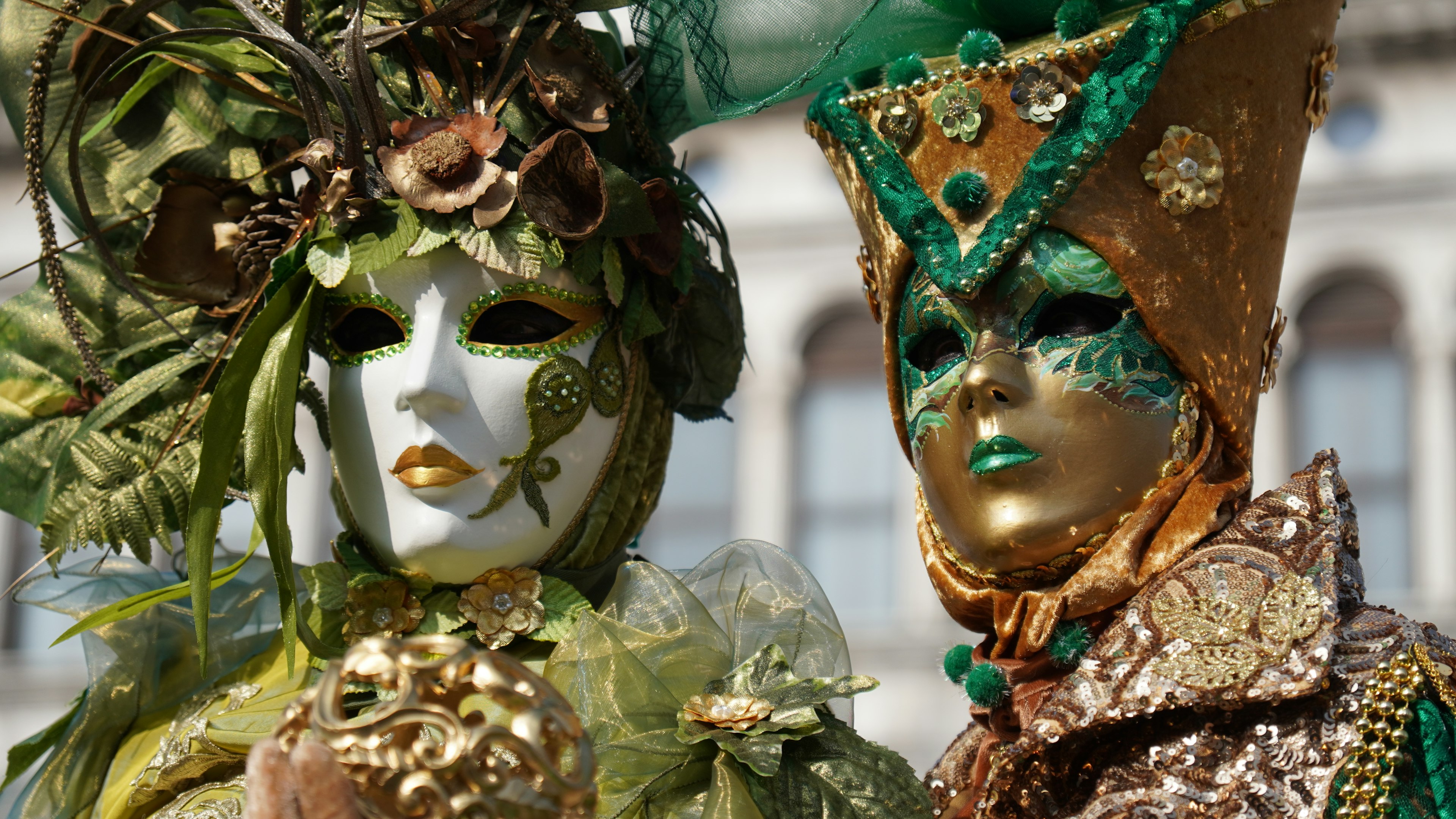 People with traditional constumes in Venice Carnival