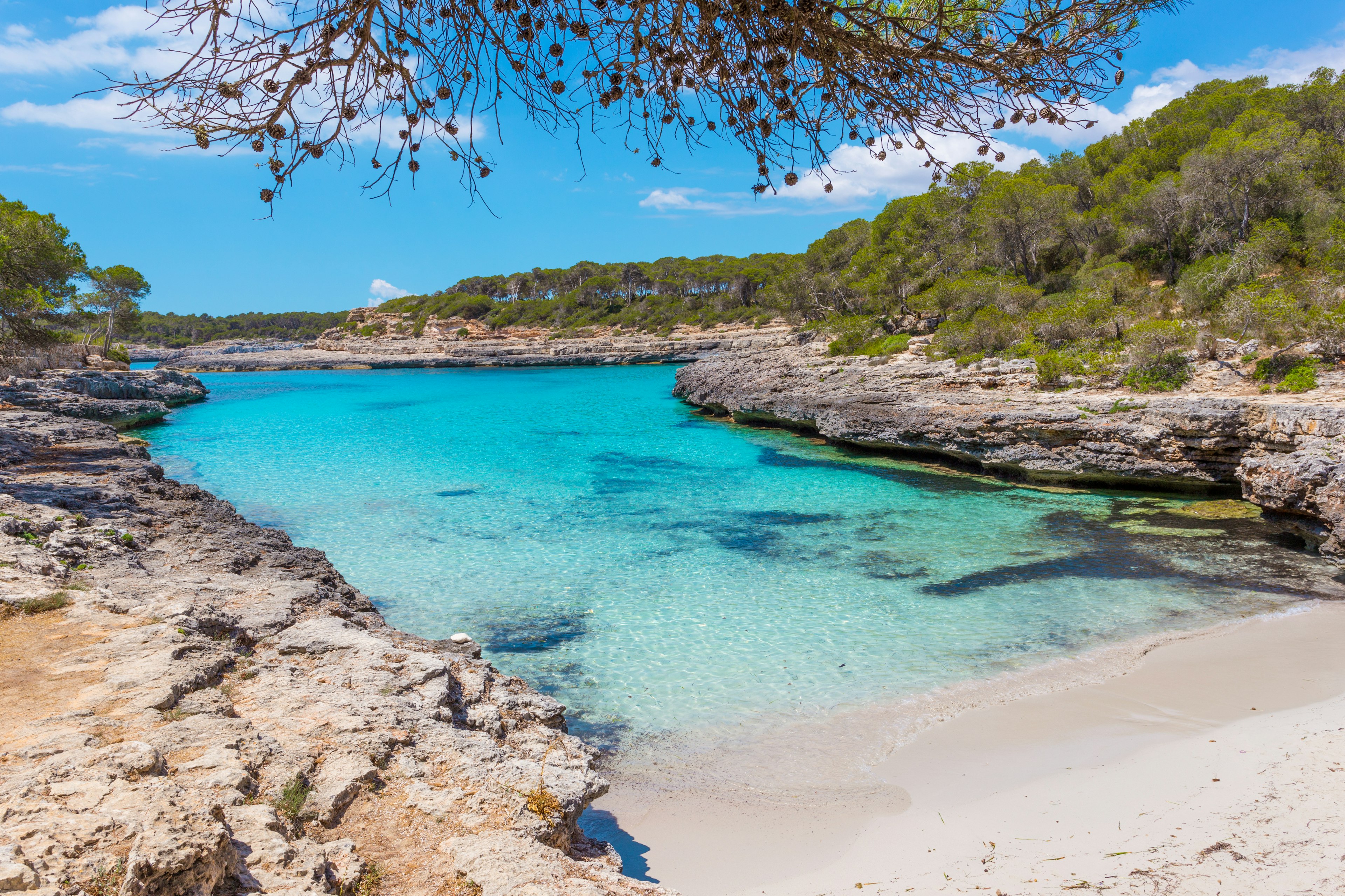 Turquoise waters of a bay in the Mondrago Natural Park, Mallorca, Spain