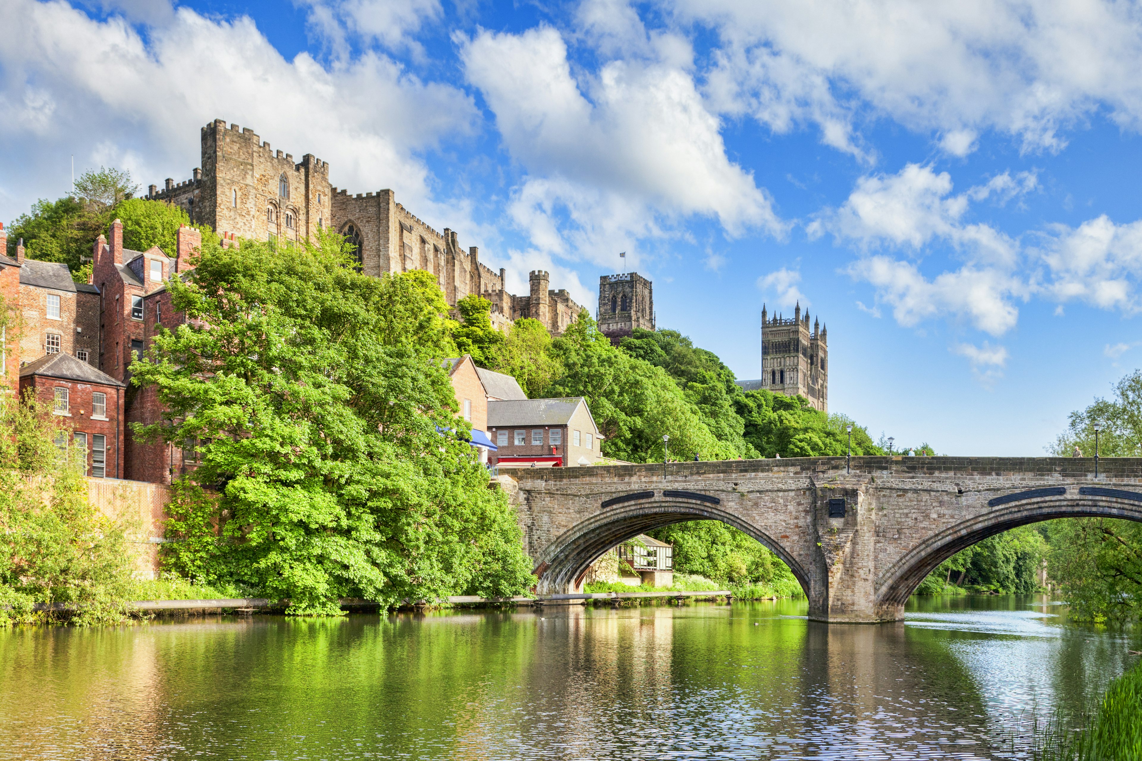 Durham Castle and Cathedral on their rock above the city, and Framwellgate Bridge spanning the River Wear, England, UK