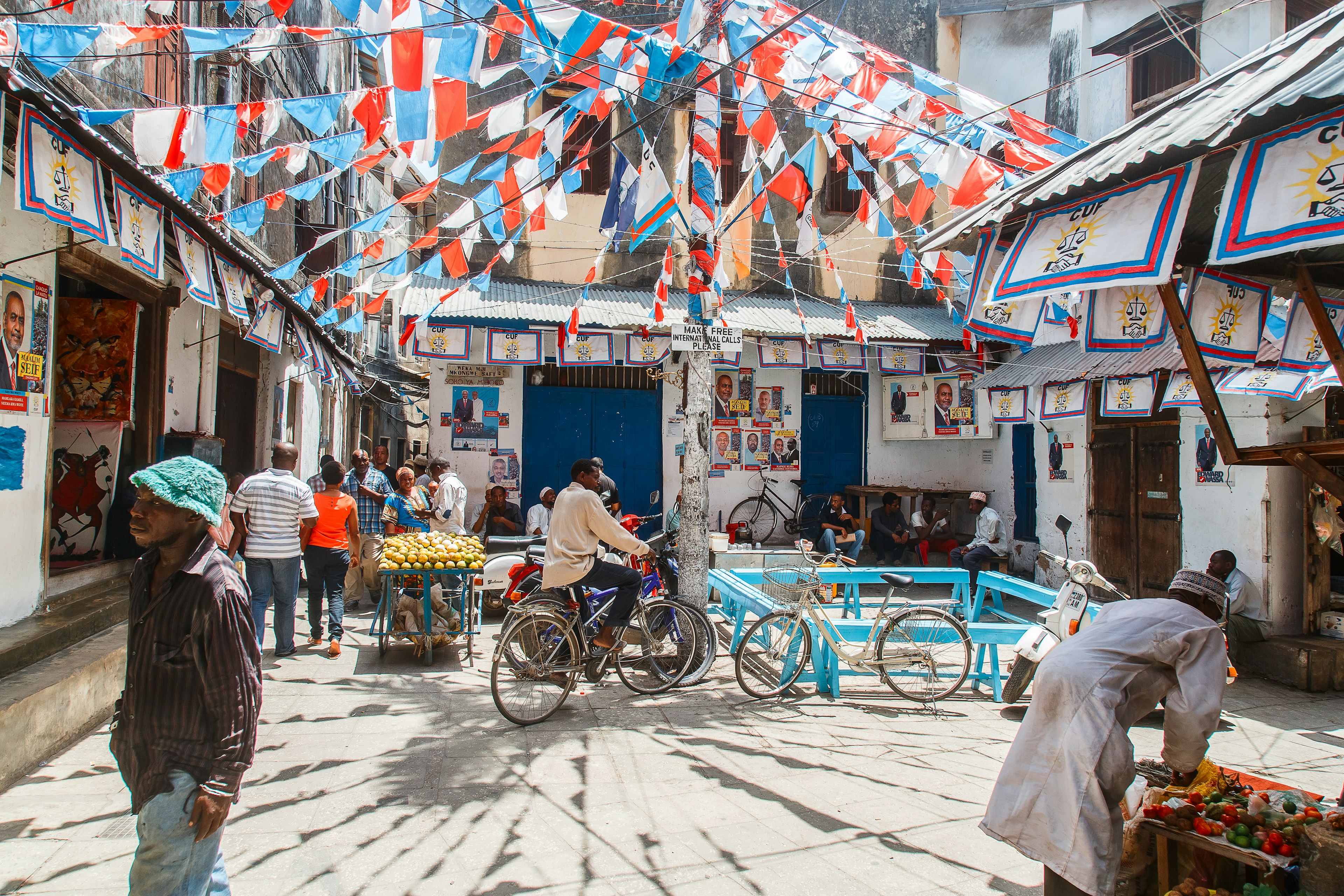 Local people on a square in Stone Town. Stone Town is the old part of Zanzibar City, the capital of Zanzibar, Tanzania