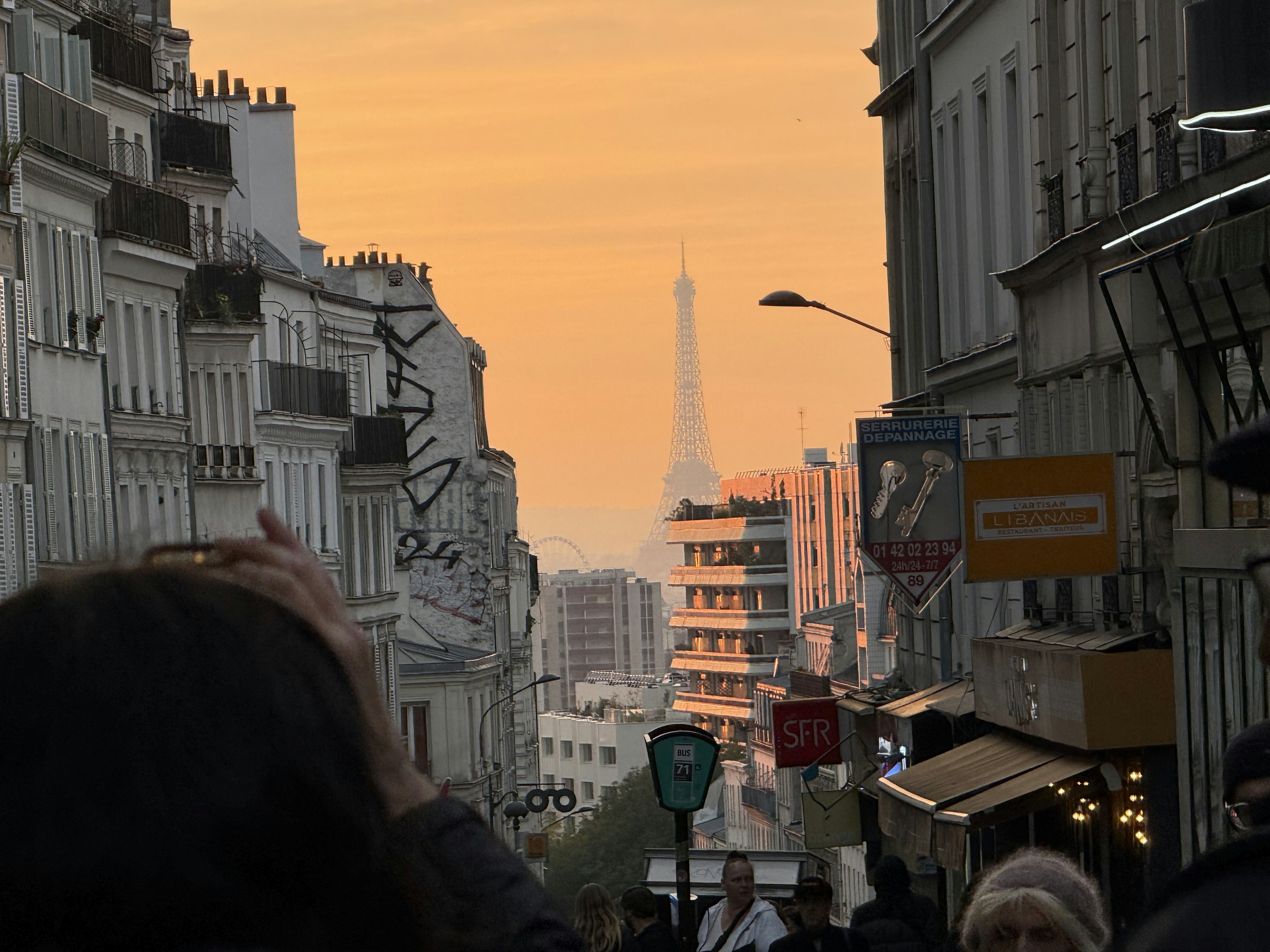 Taking in views of the Effel Tower from Belleville, Paris