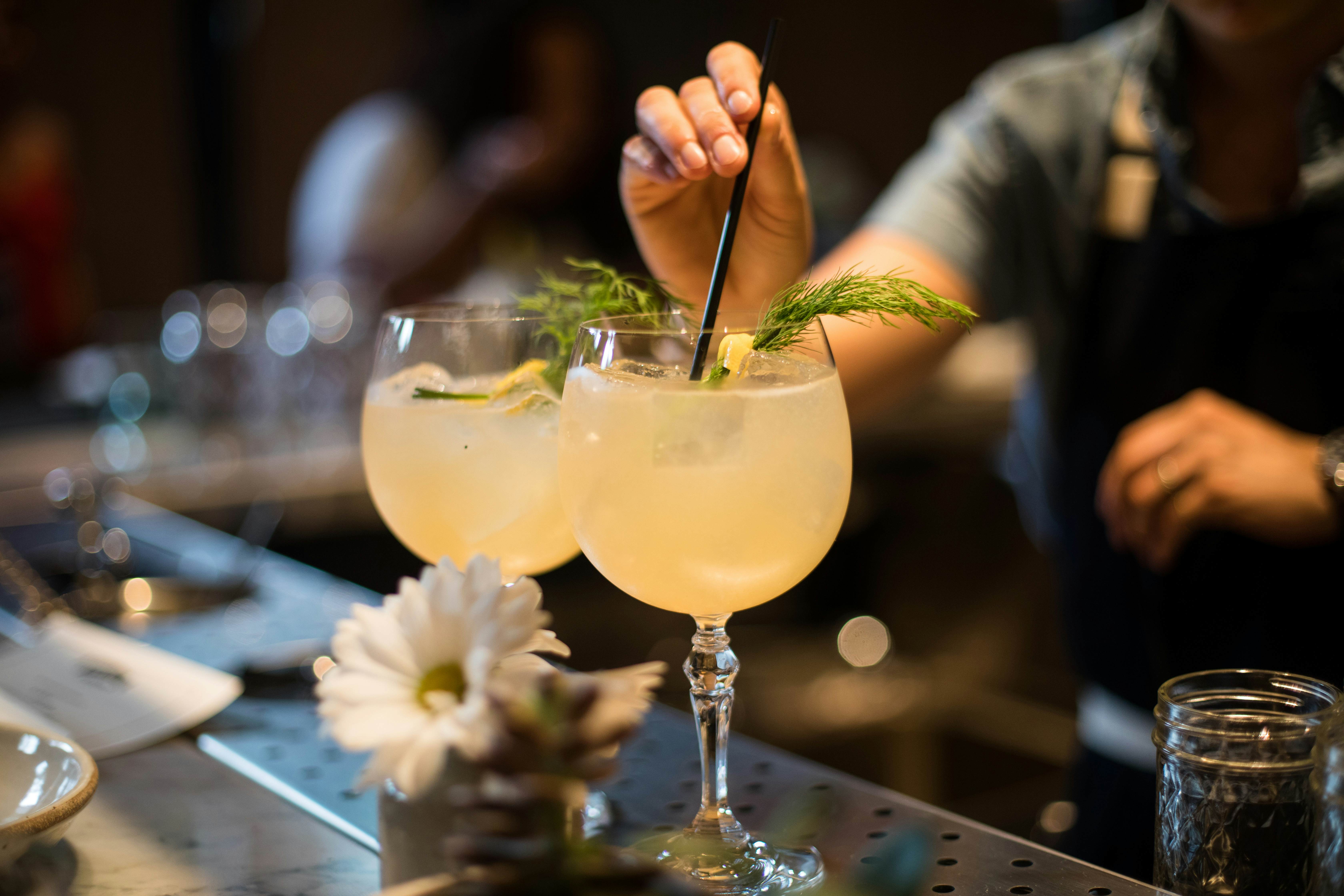 A bartender mixes cocktails in a bar in Washington, DC.