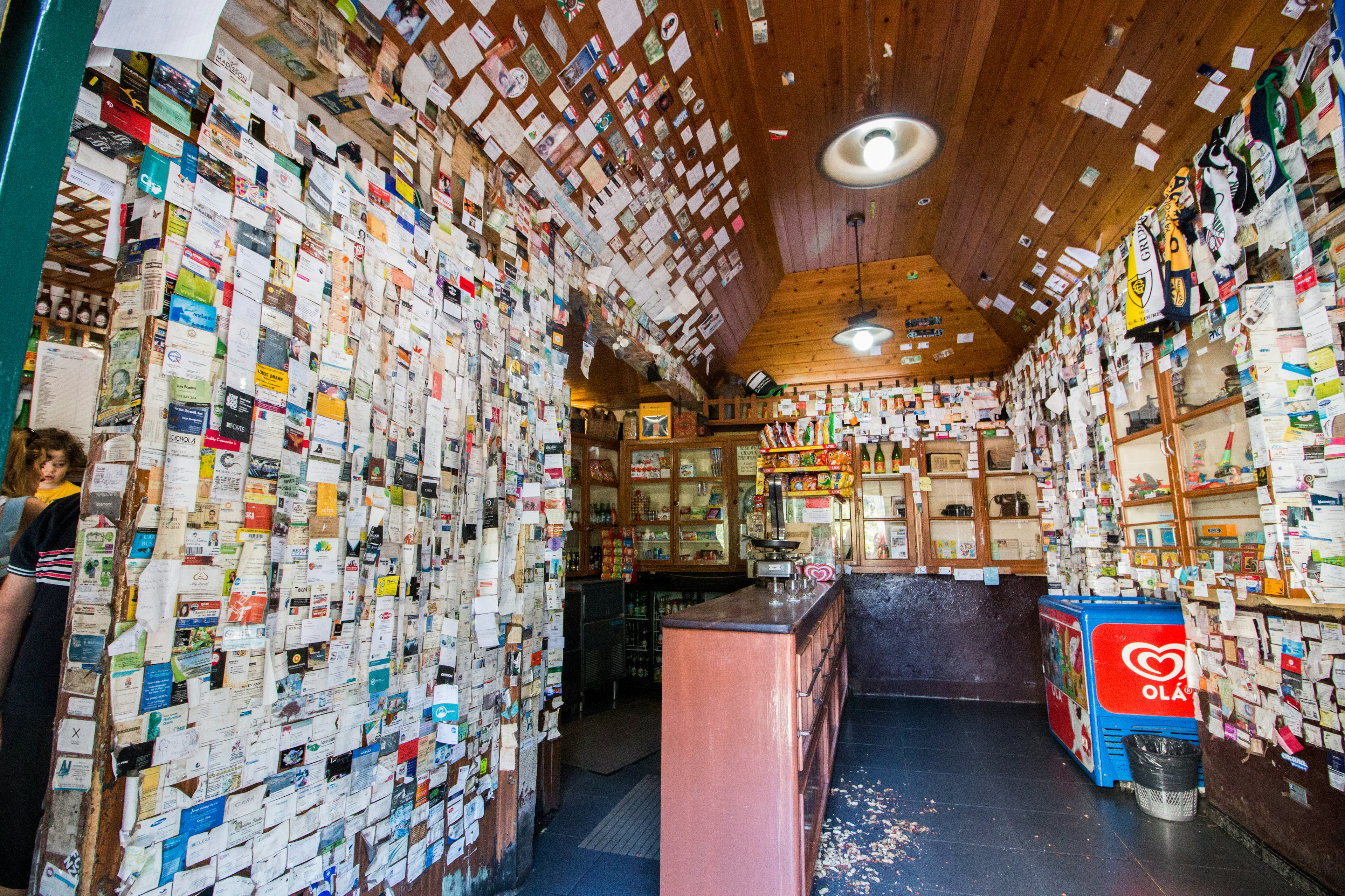 A bar in Madeira with walls covered in leaflets