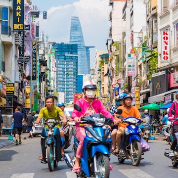 April 27, 2018: Scooter riders and pedestrians on Bui Vien Street with hotels and the Bitexco Tower.
1110086963
adventure, asia, asian, beautiful, bikes, bui vien, building, busy, chi, city, colorful, culture, destination, downtown, drive, exotic, food, ho, holiday, indochina, landmark, life, lifestyle, light, minh, modern, moto, motorbike, motorcycle, old, people, pink, portrait, road, sai gon, saigon, shop, south, southeast, street, tourism, town, traditional, traffic, travel, urban, vacation, vietnam, vietnamese, woman