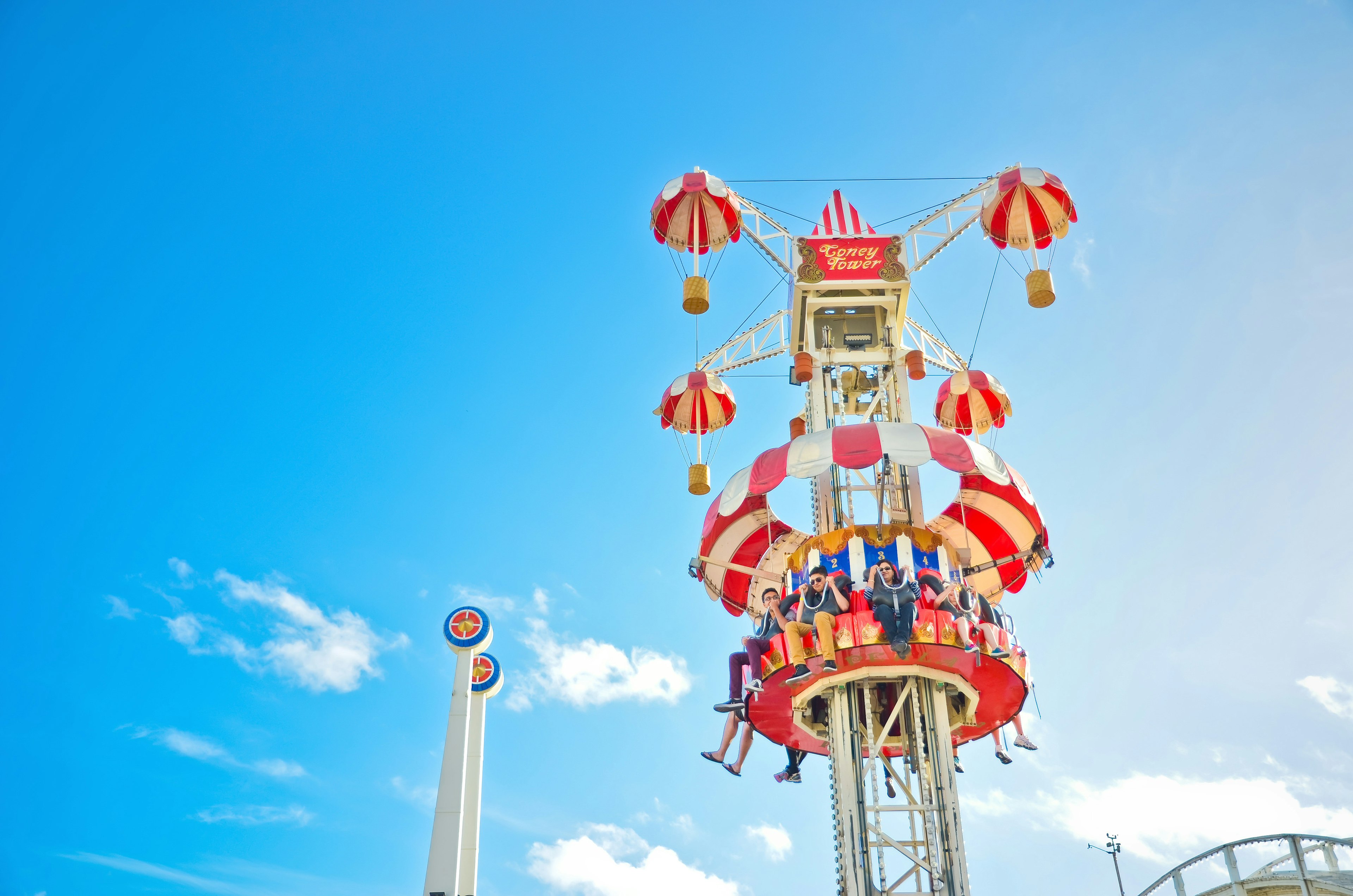 People playing at Luna Park amusement park where is located at St Kilda Beach in Melbourne on January