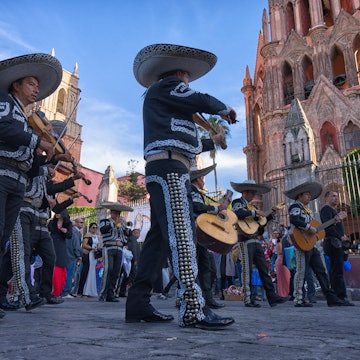 San Miguel de Allende on February 13, 2016: a mariachi band performing in the main square of the colonial town during a wedding.
736422115
america, event, guanajuato, instrument, mariachi, men, mexico, music, outdoors, plaza, san miguel de allende, square, street, tourism, wedding