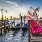 Woman in masks and costumes at the Venetian carnival.
752481766
NULL