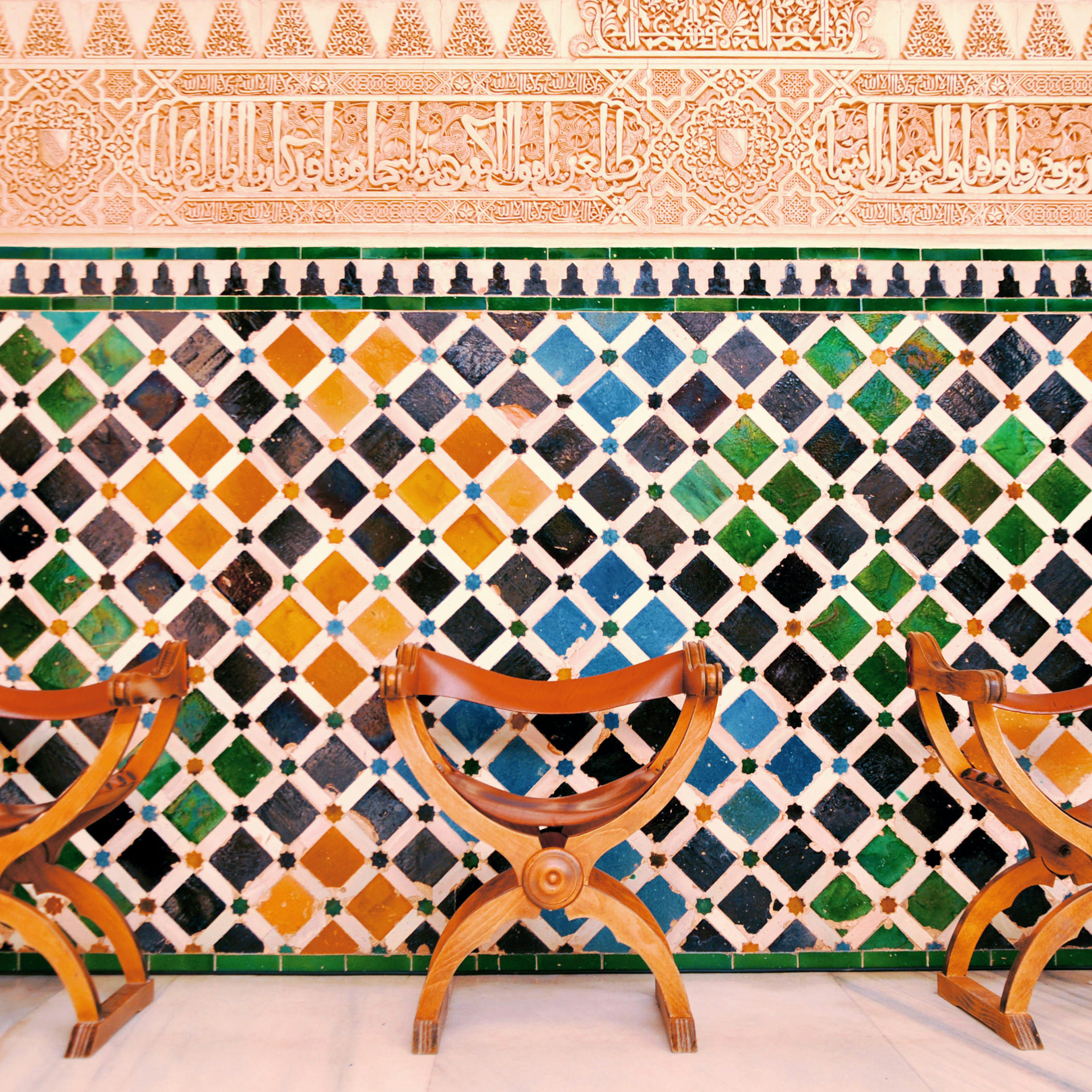 Colorful tiled wall in the courtyard of a Moorish-style palace