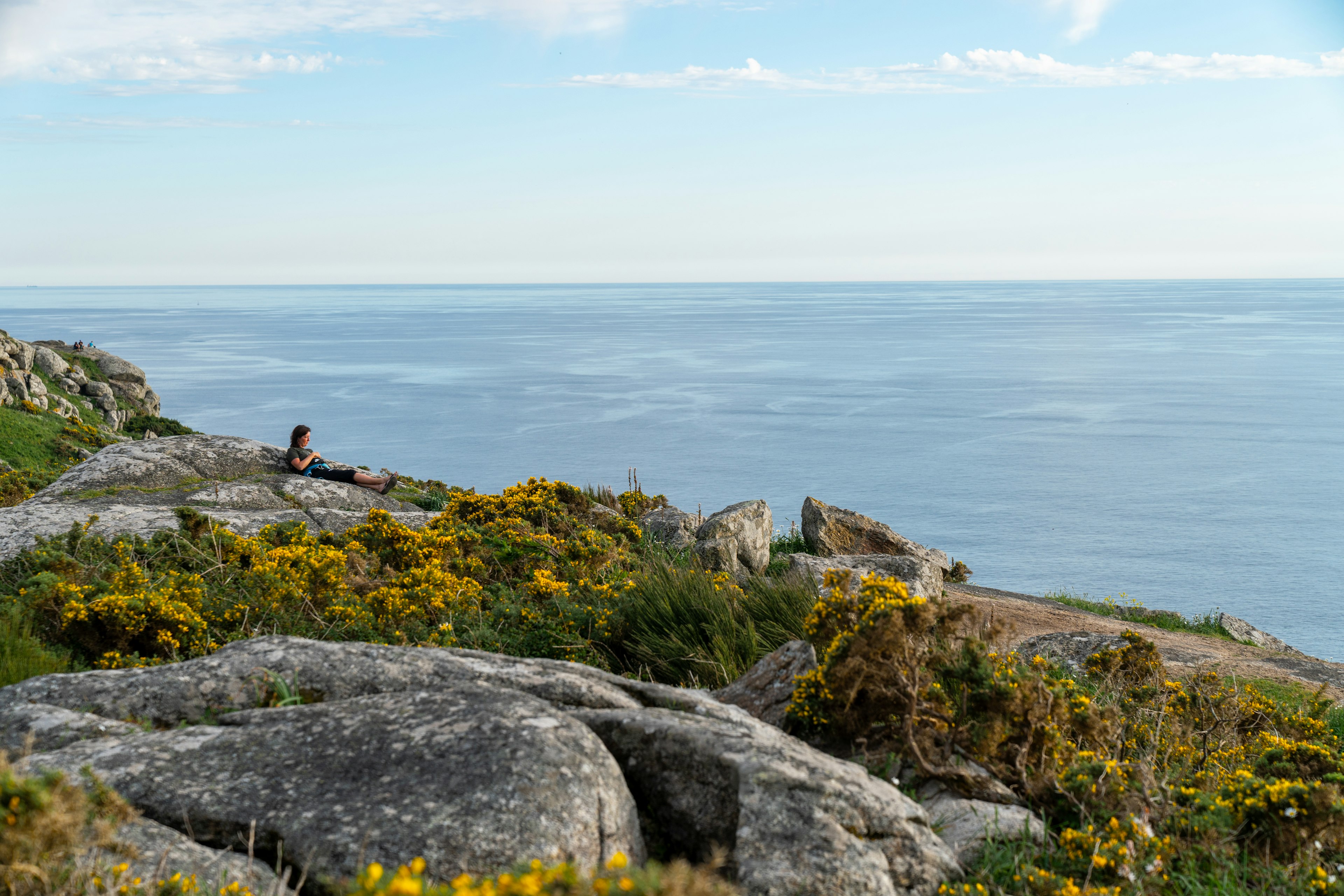 The ancient Romans thought Finisterre was the end of the world.  Now there is a lighthouse that many people visit at sunset where they leave behind (and sometimes burn) their old clothes and shoes to symbolize a new beginning.  Finisterre is often the last stop for many pilgrims who made the pilgrimage to the Cathedral of Santiago de Compostela on one of the Caminos de Santiago de Compostela.