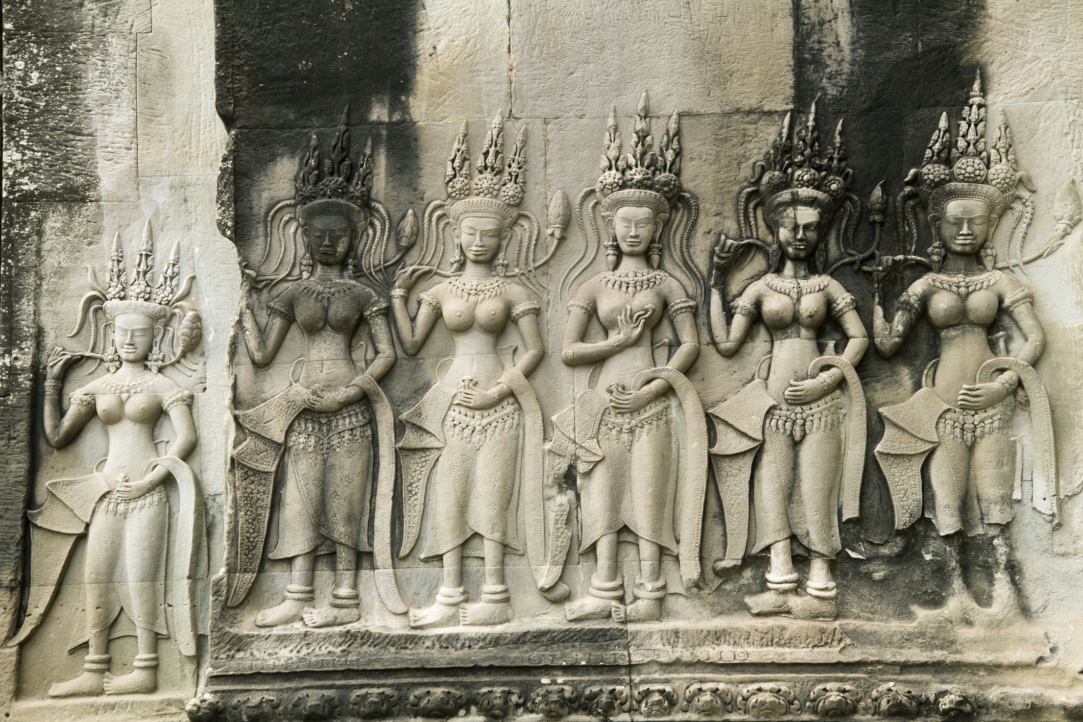 Bas-relief carvings of apsaras at Angkor Wat in Cambodia.